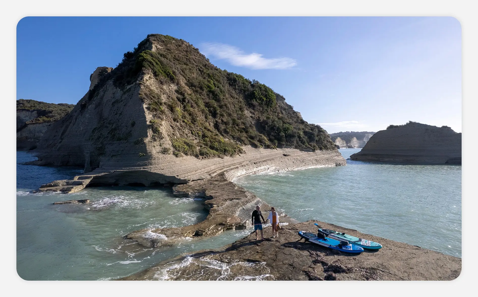 Couple holding hands exploring Corfu