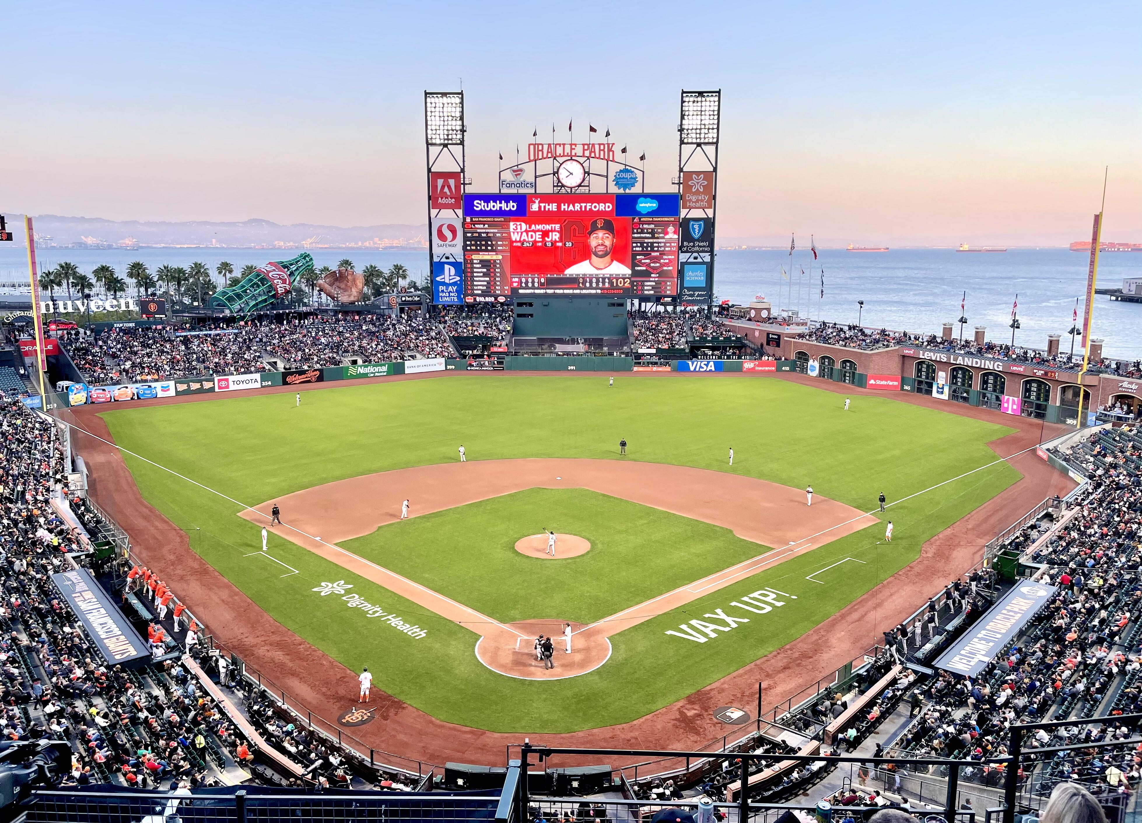 Outdoor photo of Oracle Park baseball stadium in the evening.