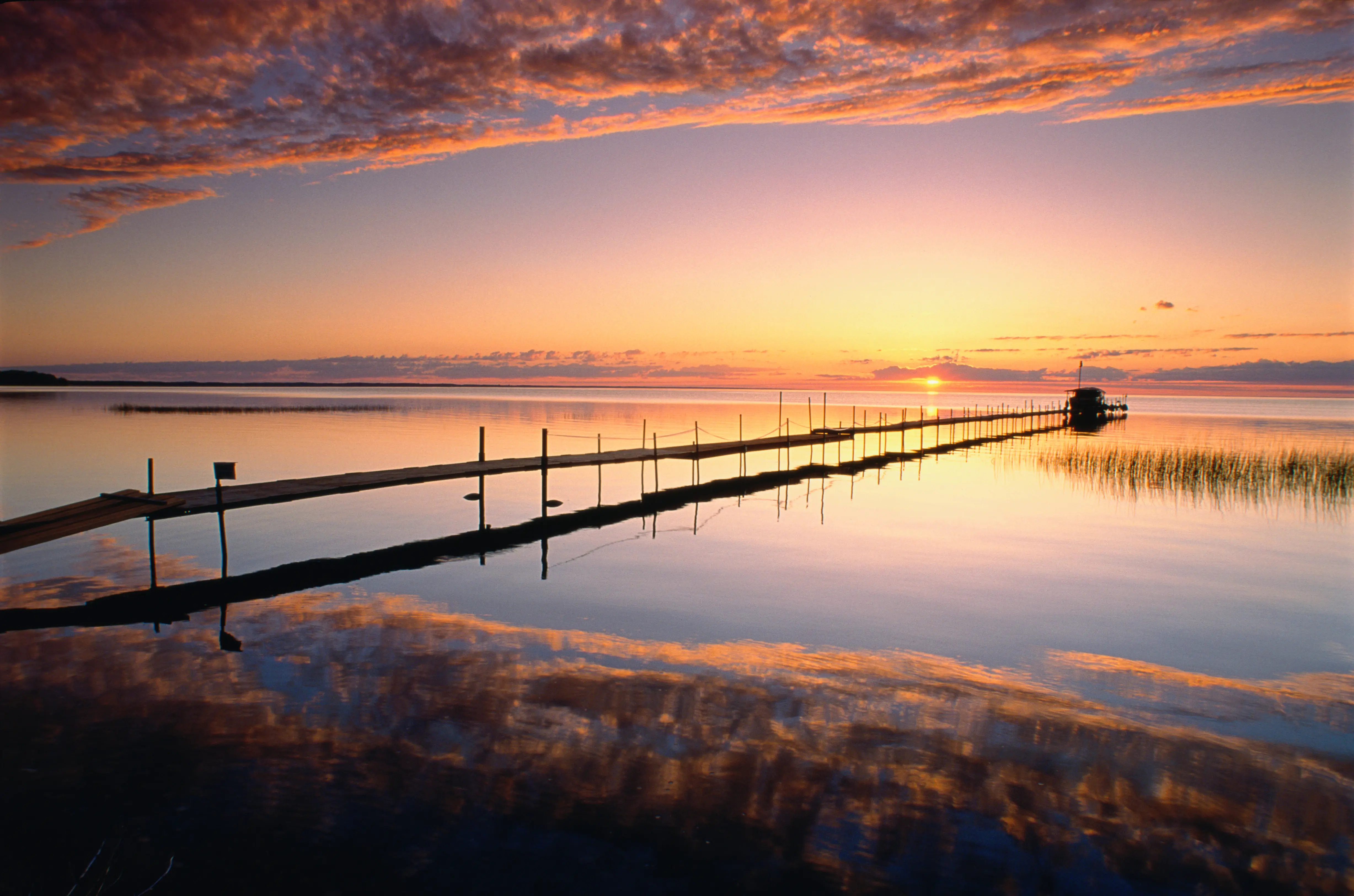 Image of a wooden dock on Mille Lacs Lake, Minnesota.