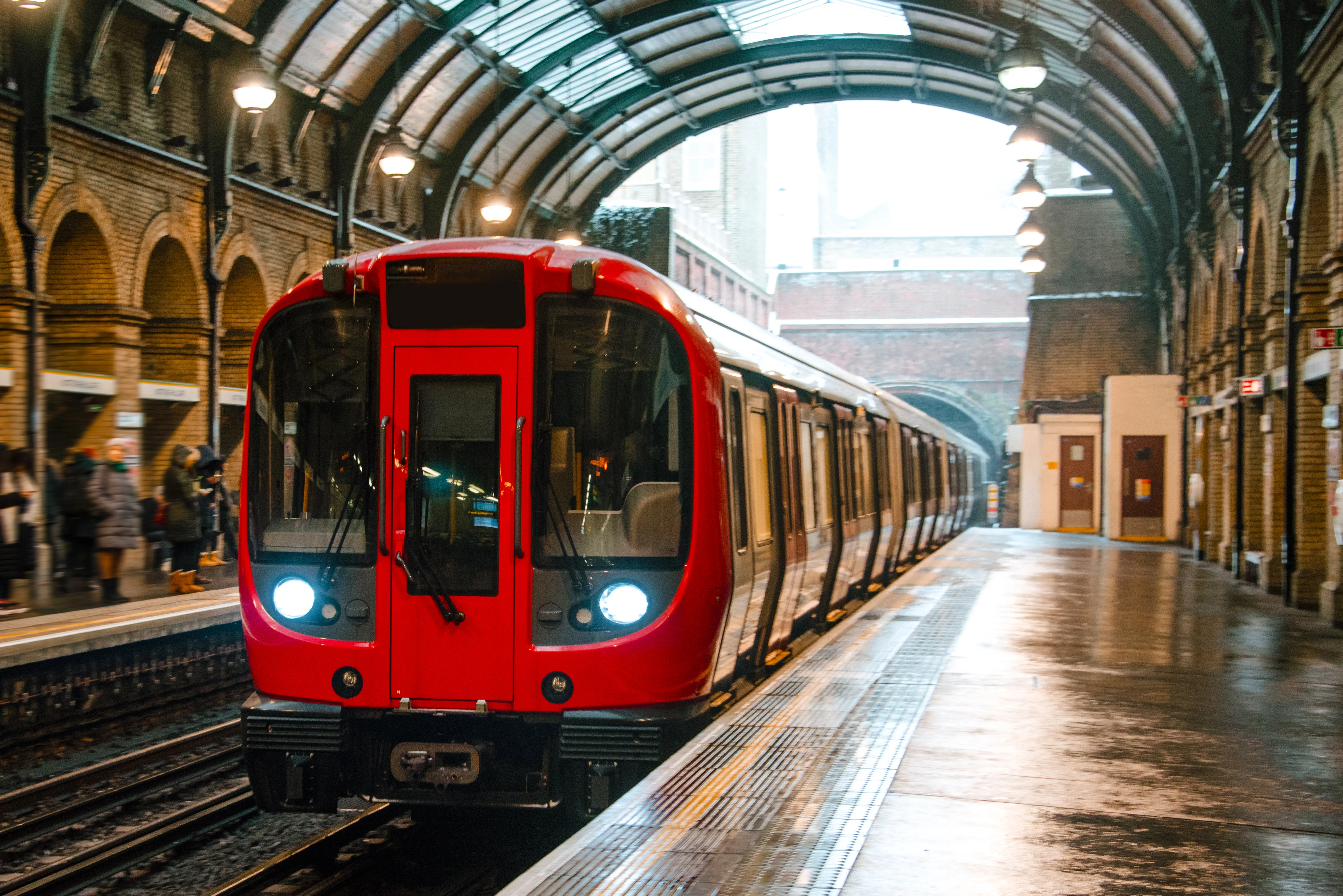 London Underground, the Tube, red train at a station