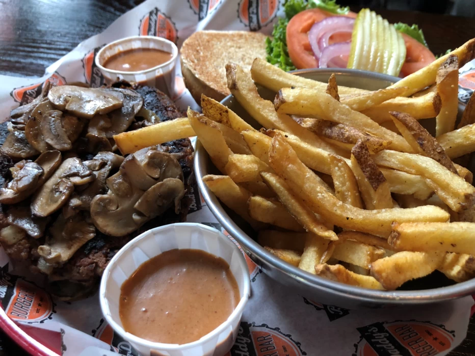 Bad Daddy's Burger Bar features made-to-order burgers and a number of sides, such as fries and potato tots. Don't miss the banana pudding. The small restaurant chain started in Dilworth, the quaint neighborhood of Charlotte.