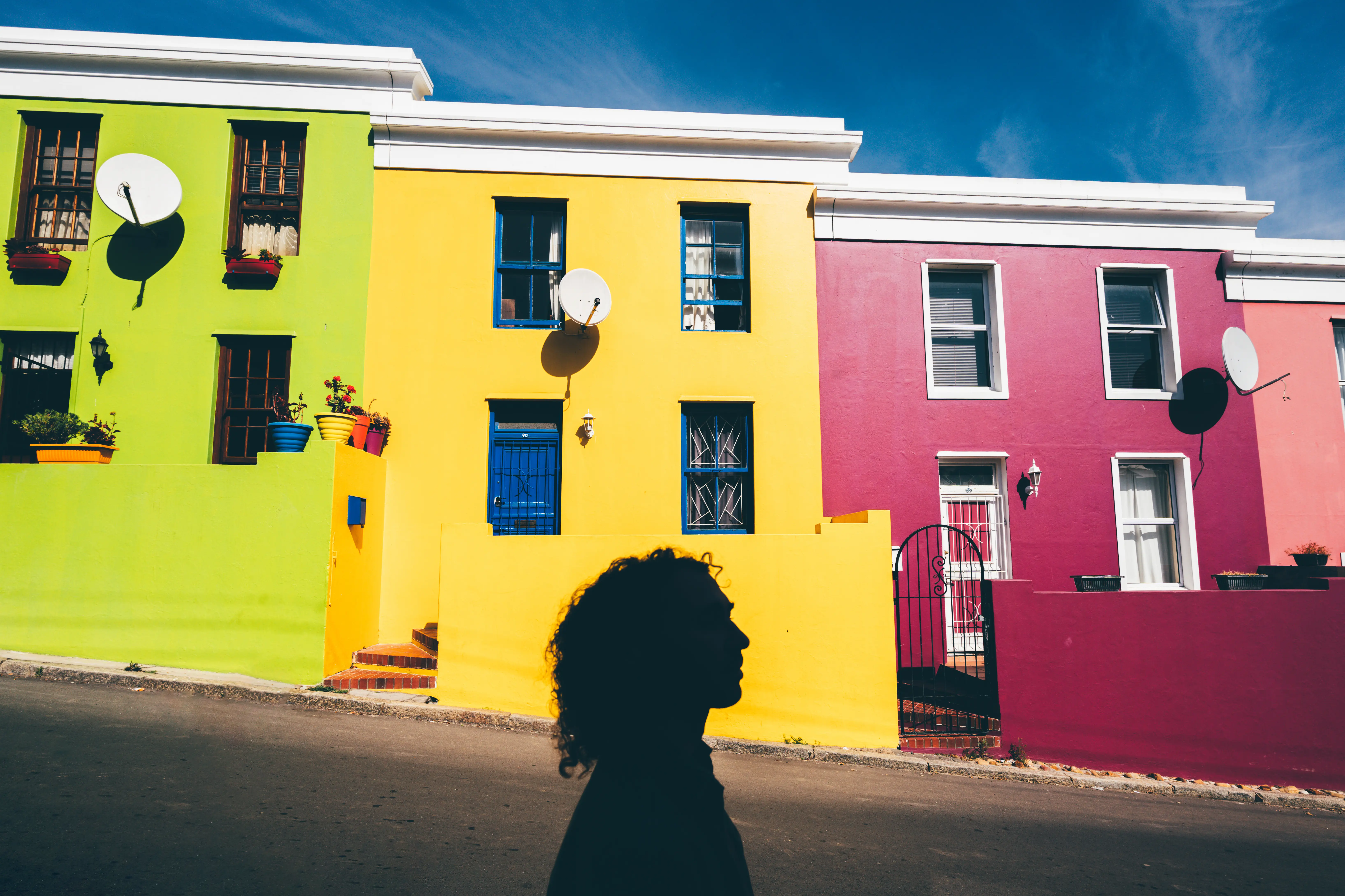 Photo of a man's silhouette in front of a History Museum Cape Town