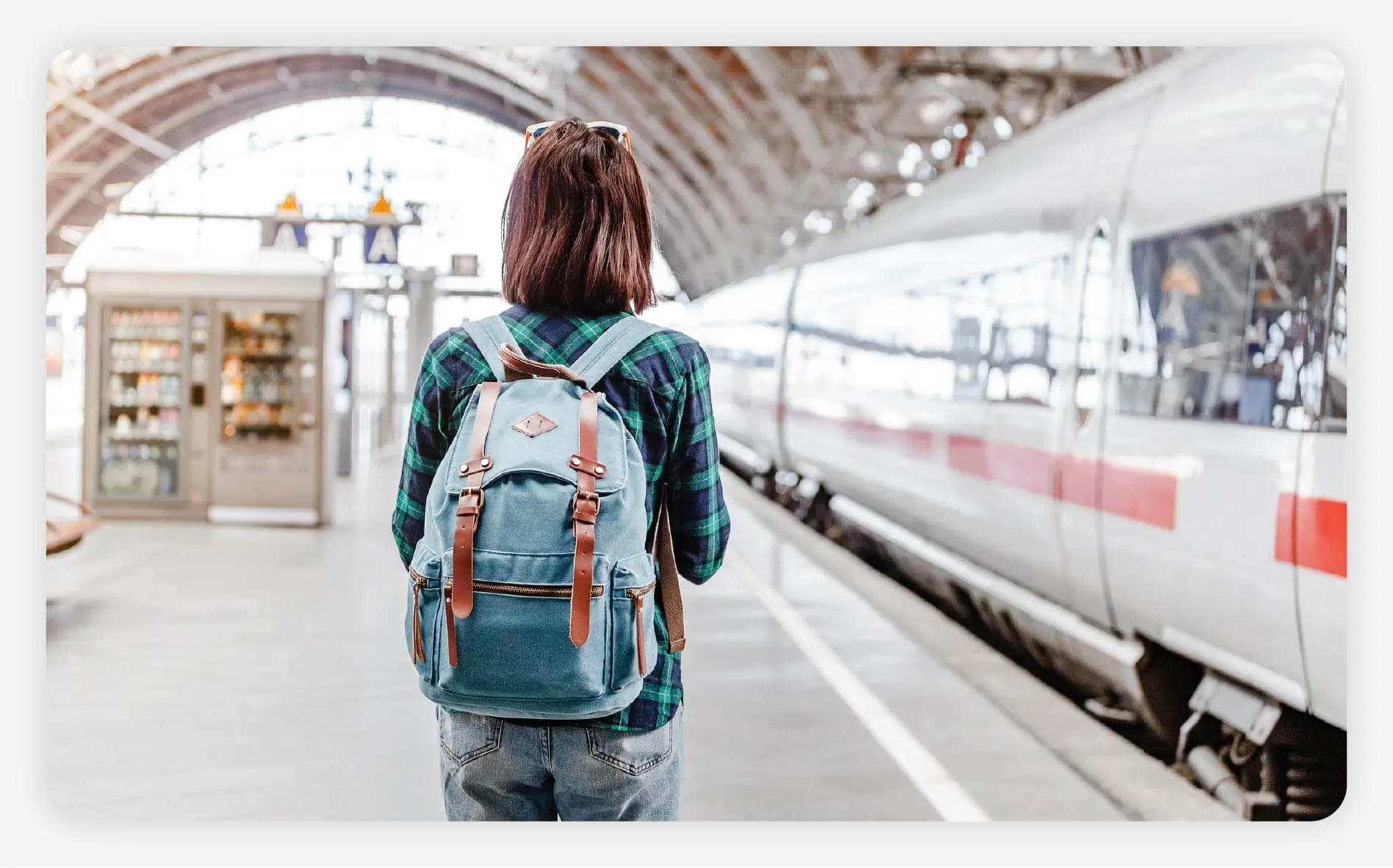 Solo female traveler at the train station
