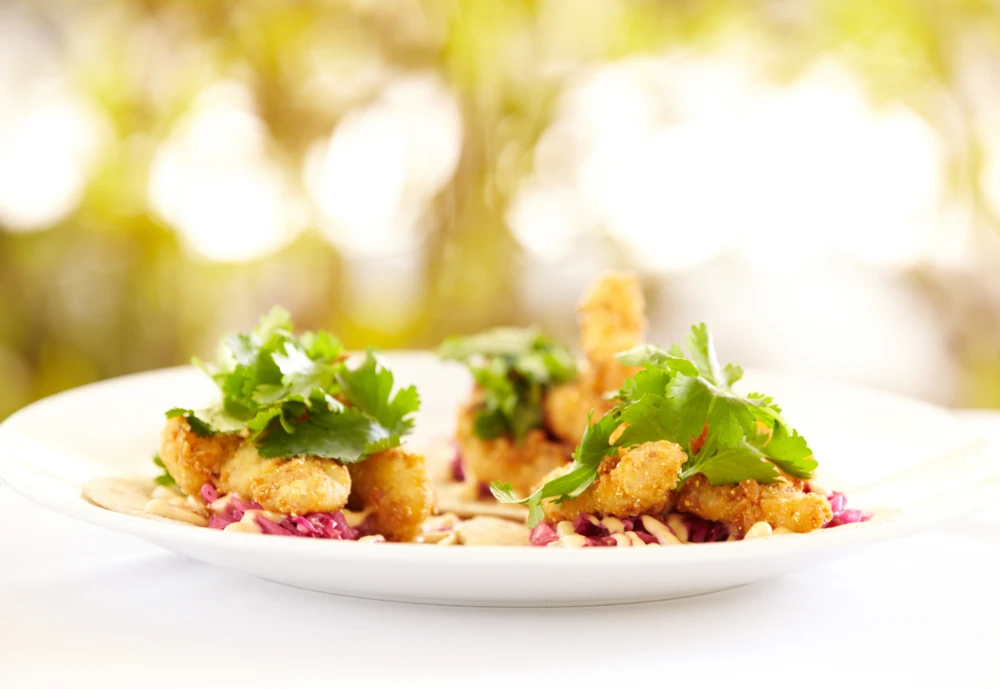 Fish taco on white plate