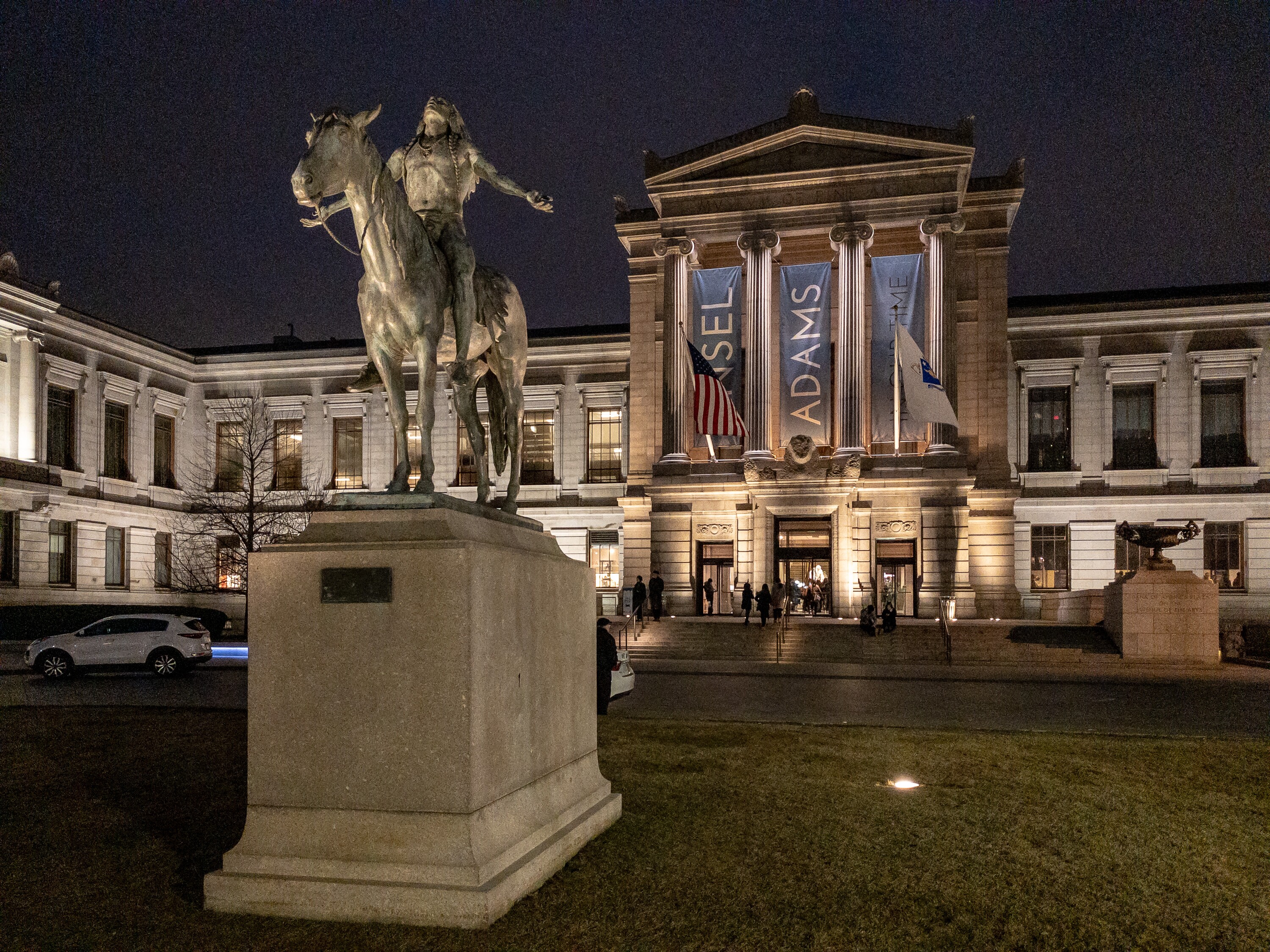 Exterior image of the Boston Museum of Fine Arts at night.