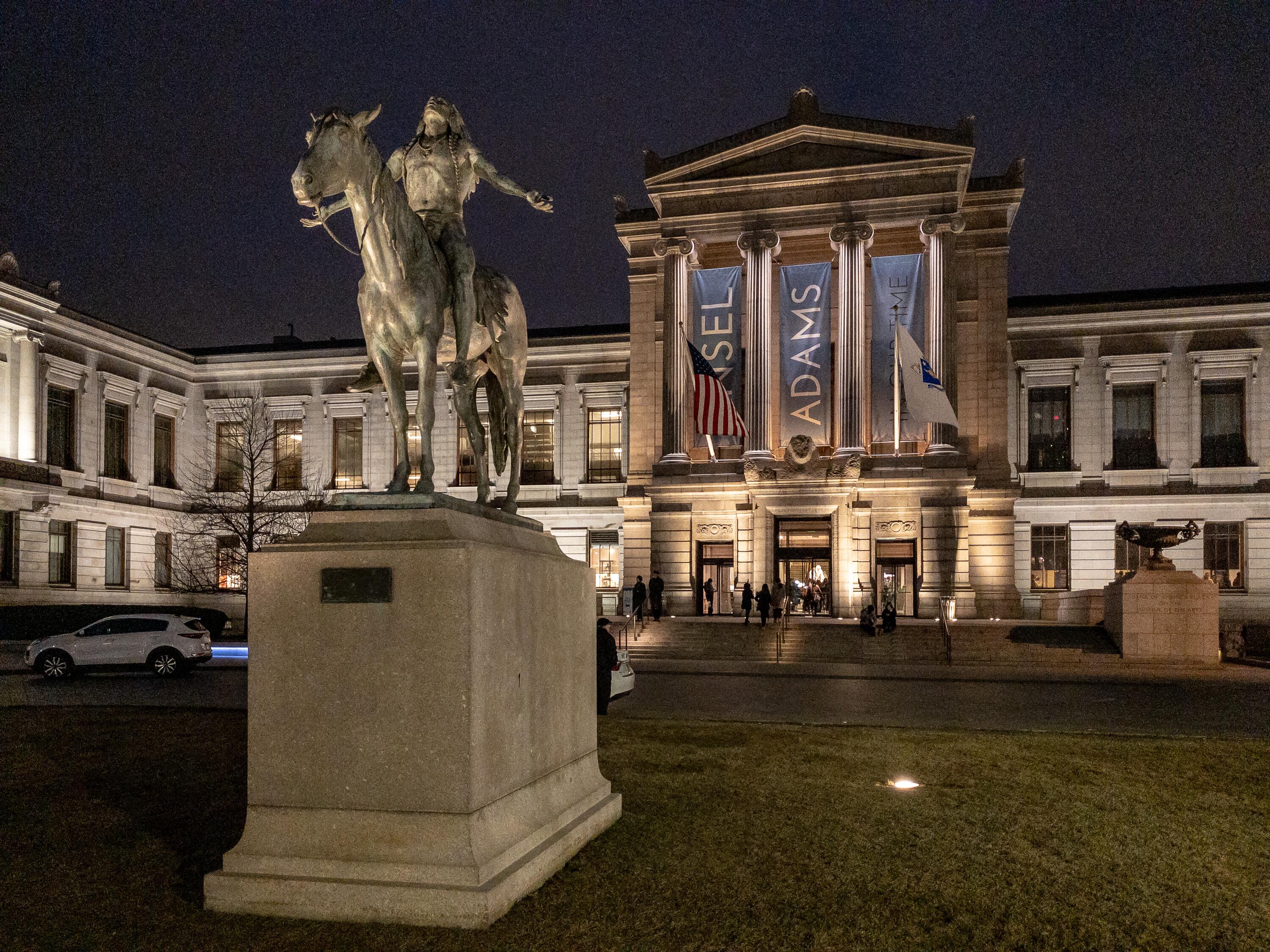 Exterior image of the Boston Museum of Fine Arts at night.
