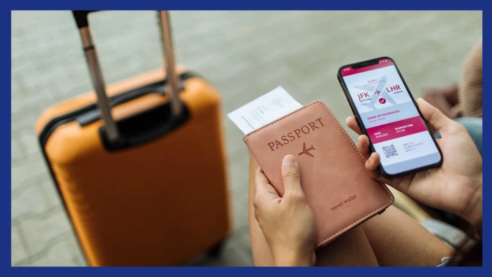 A passenger having their passport and boarding pass ready for their flight. 