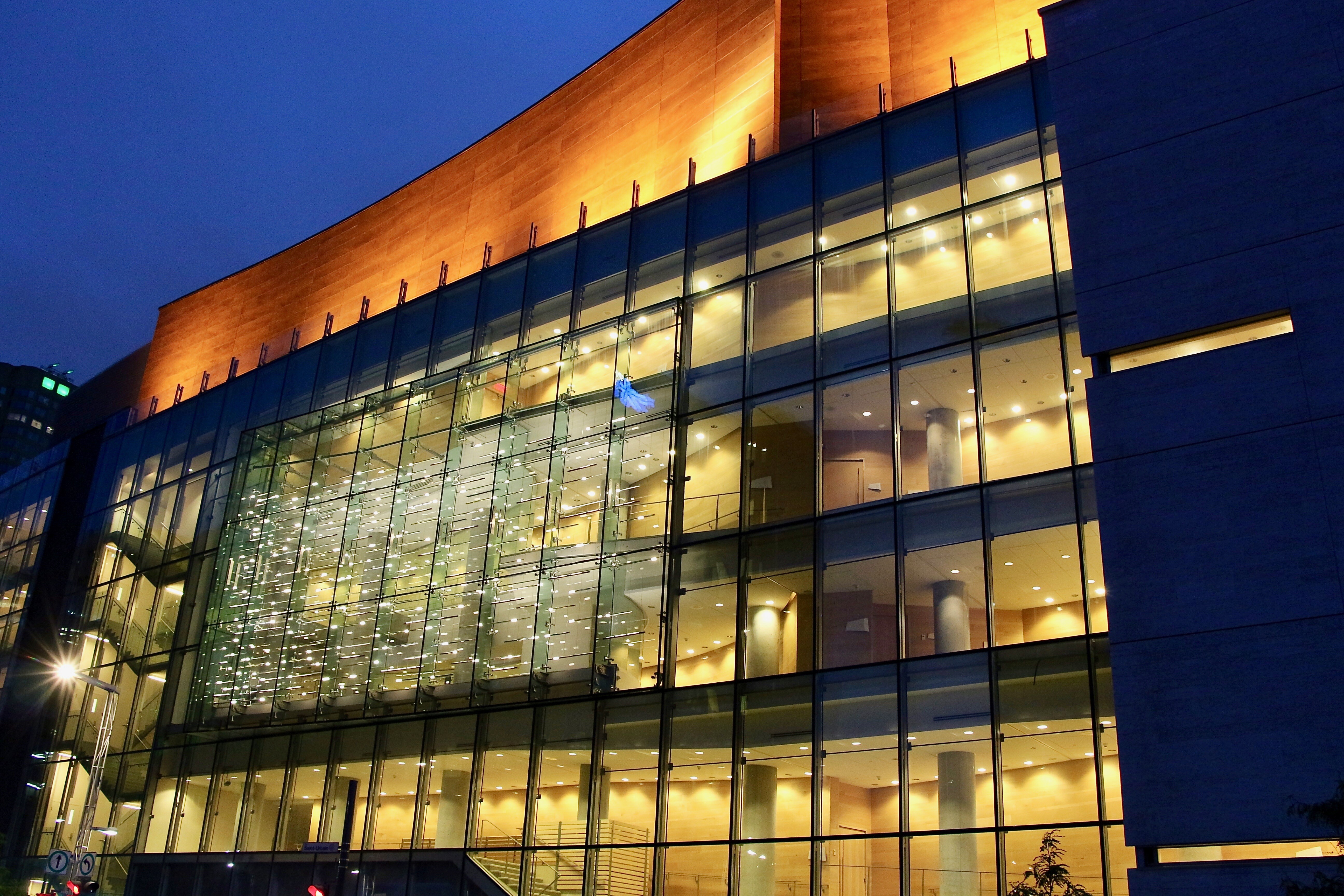 The Montreal Symphony Hall lit up in the evening.