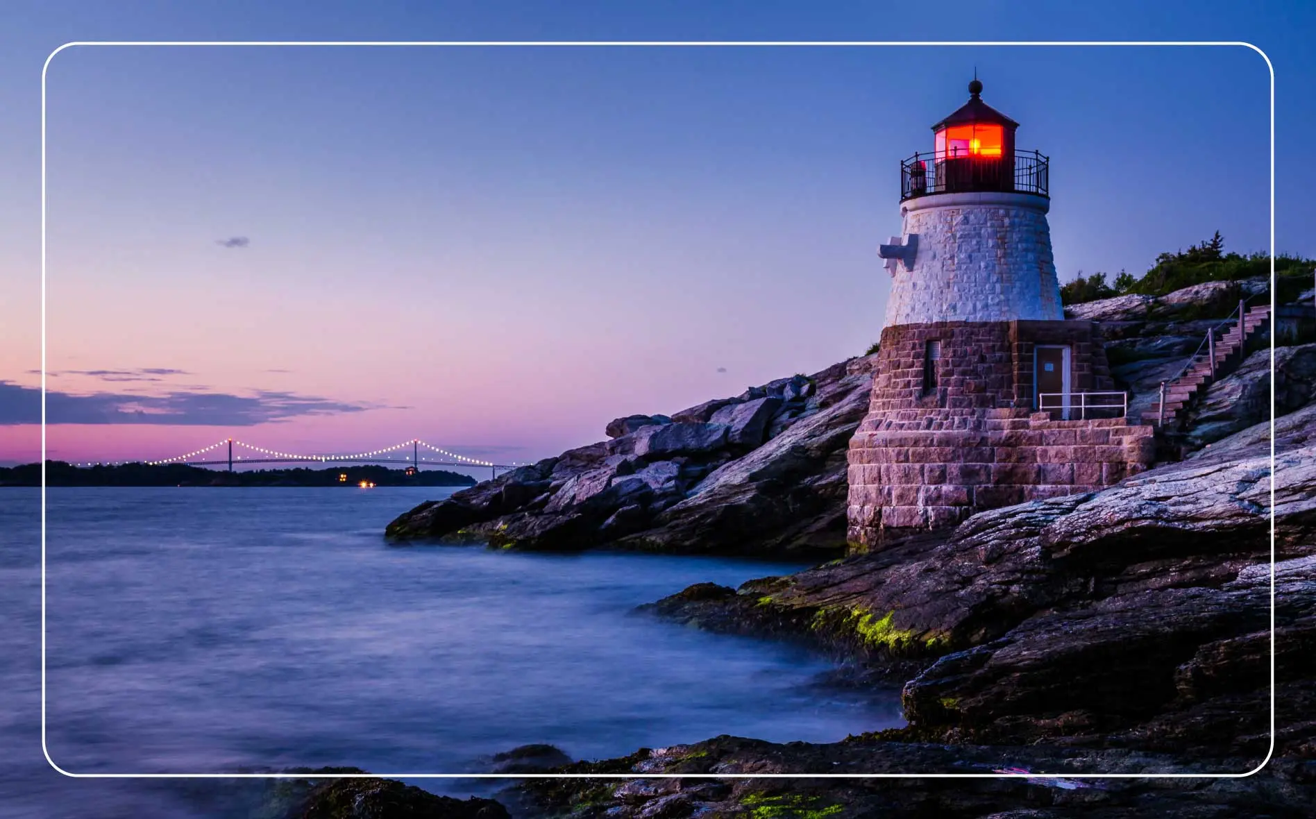 Castle Hill lighthouse stands above the ocean in Newport.