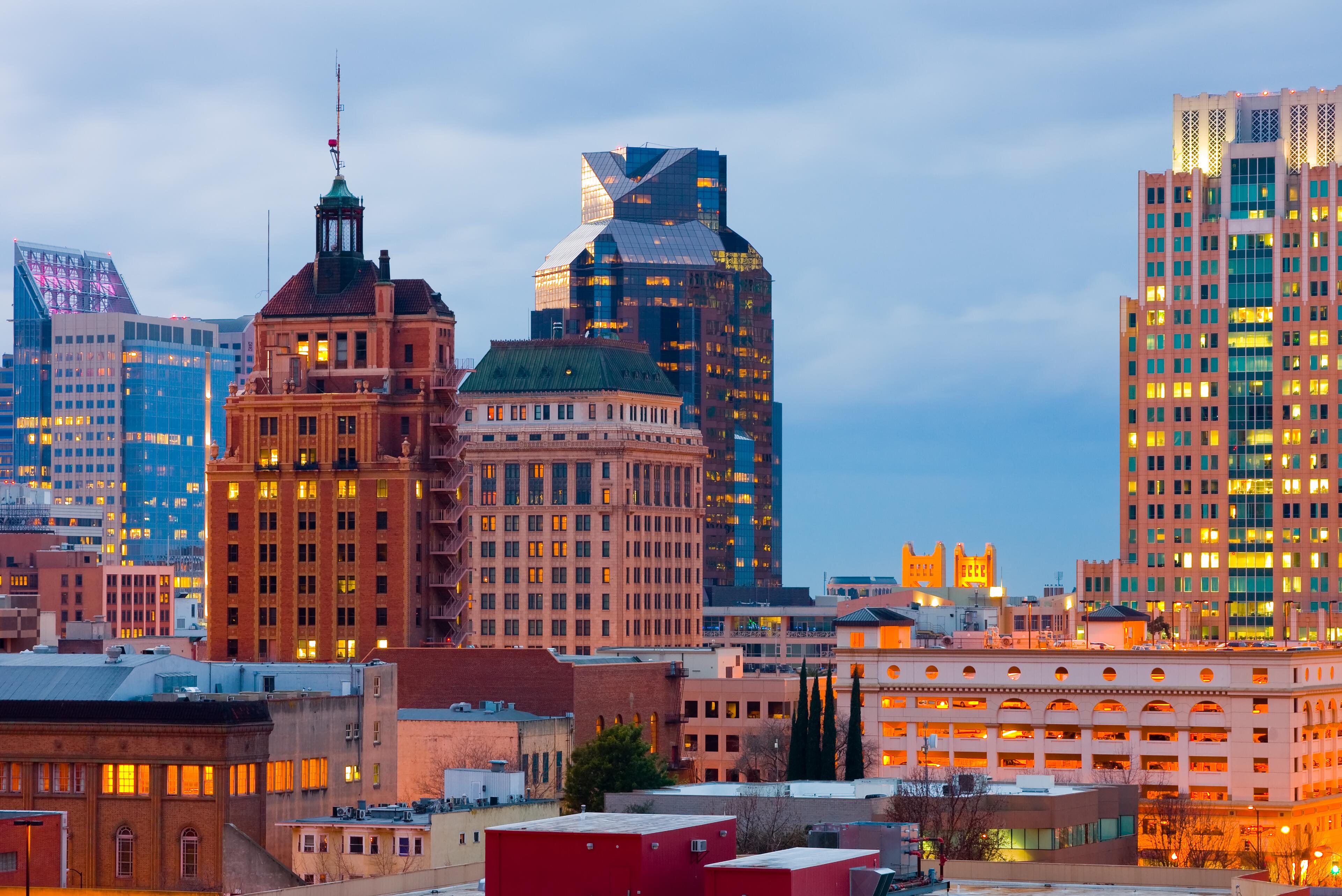 Evening view of colorful skyline buildings in downtown Sacramento, California