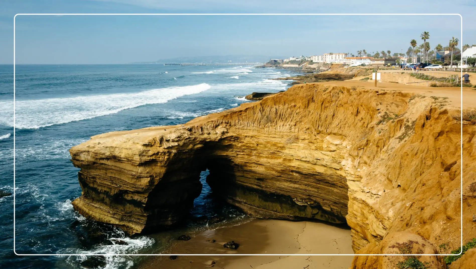 Cave and cliffs along the Pacific Ocean at Sunset Cliffs Natural Park in Point Loma, CA.