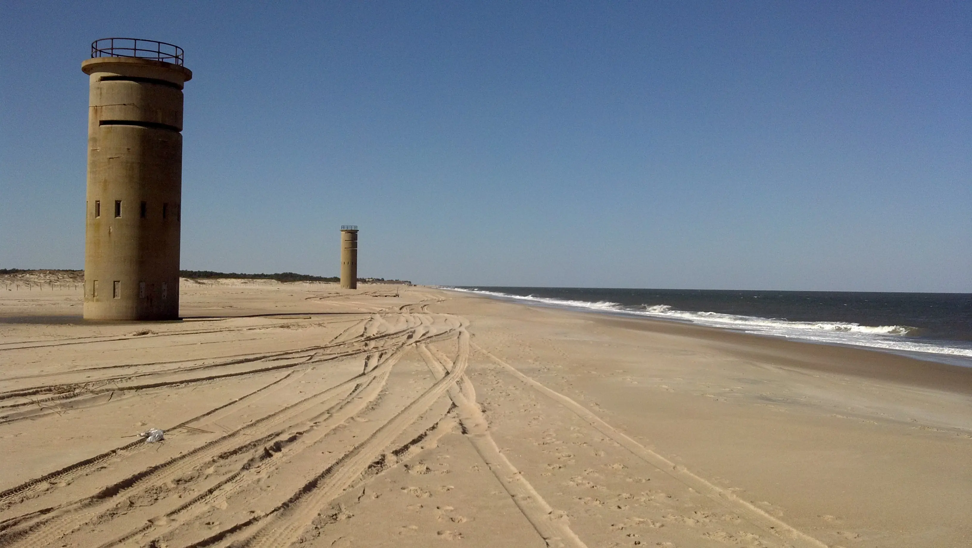 Image of some of the WWII Towers at beach of Gordon's Pond, Delaware.