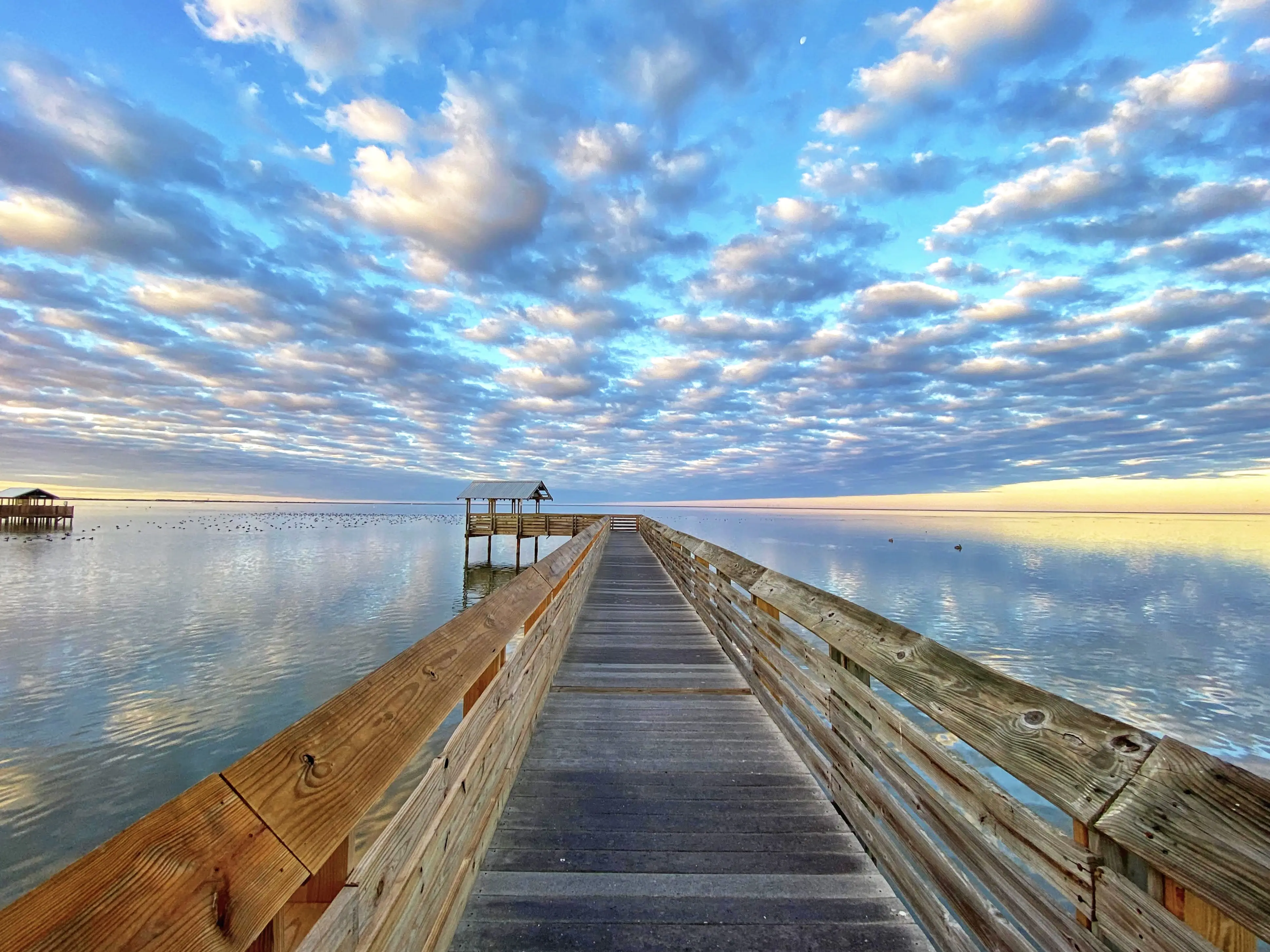 Outdoor image of clouds over the South Padre Island Boardwalk.