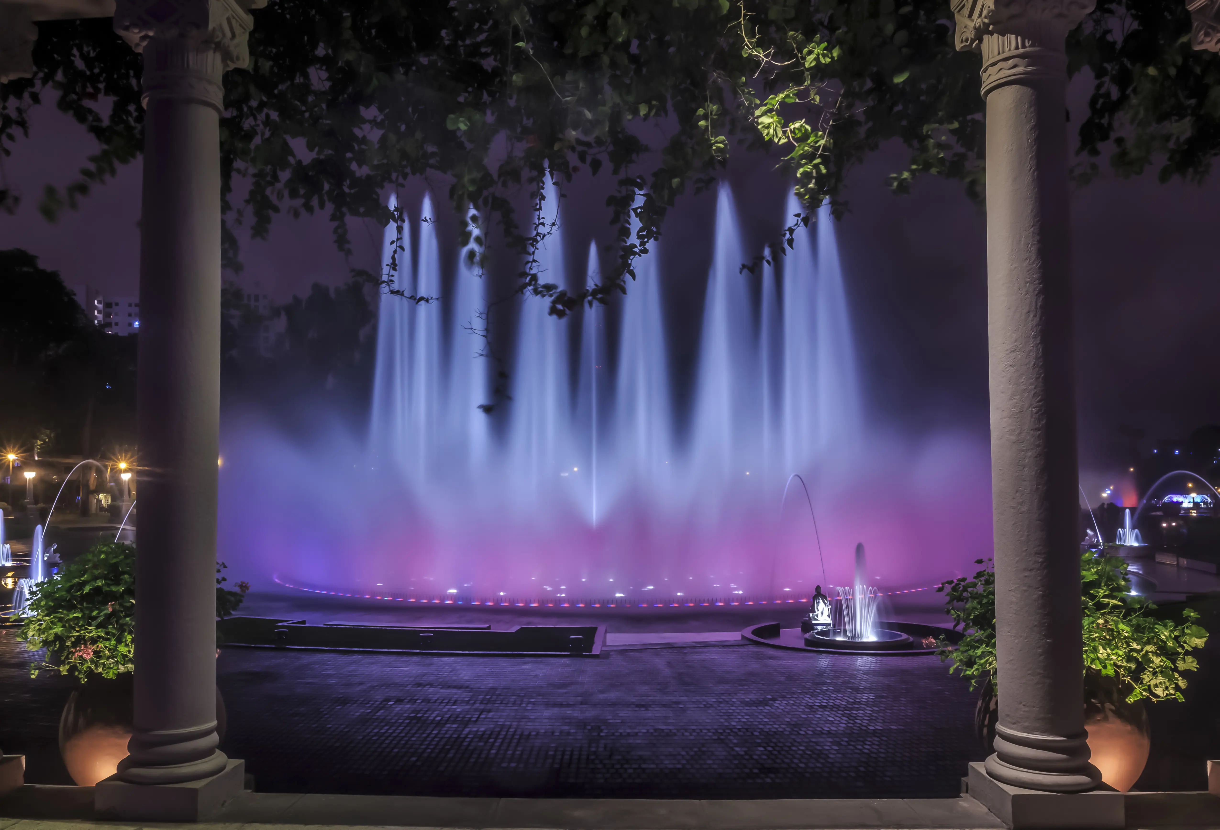 Photo of the fountain lit up at the Parque de la Reserva Lima, Peru