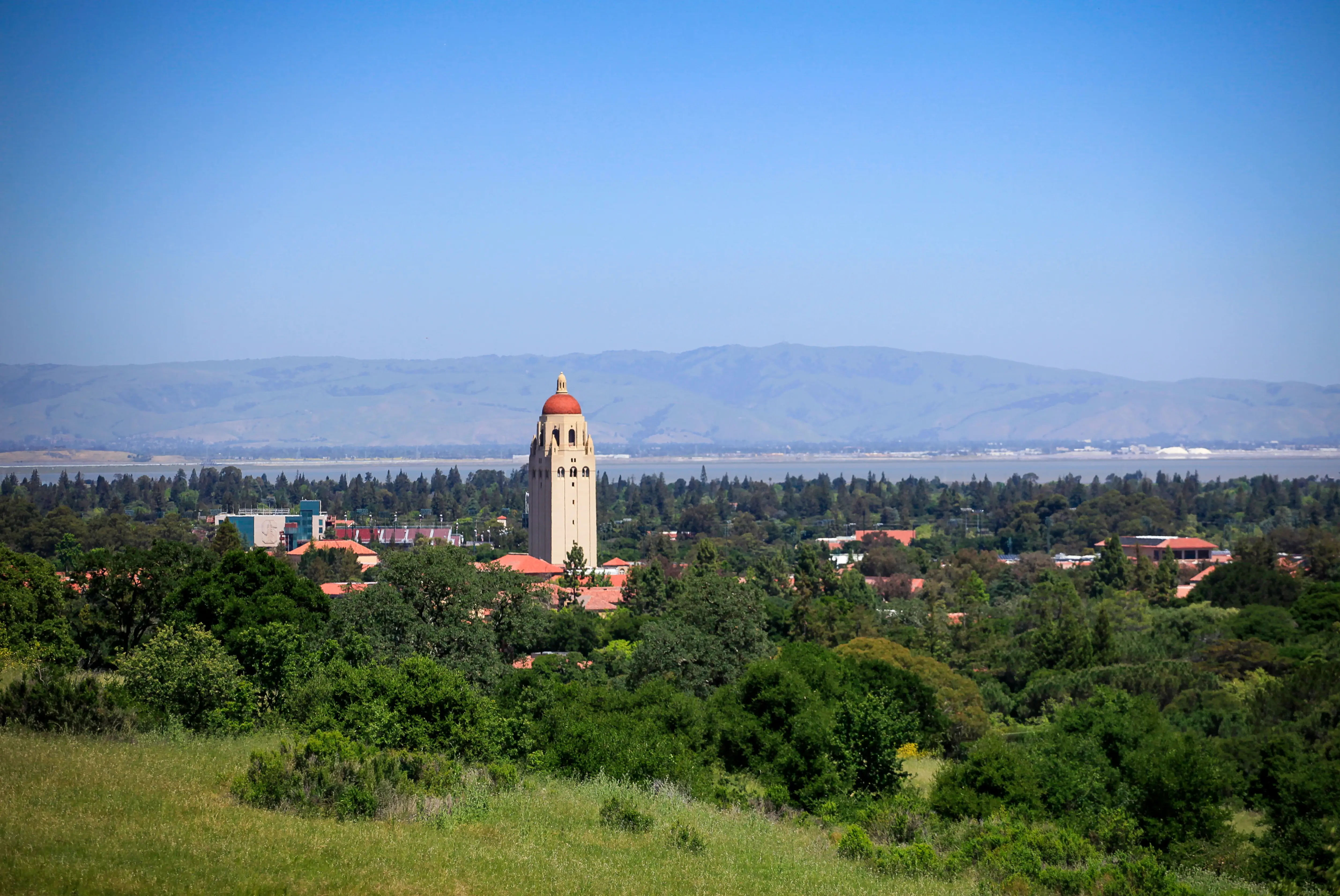 Image of Stanford University and the surrounding field and scenery.
