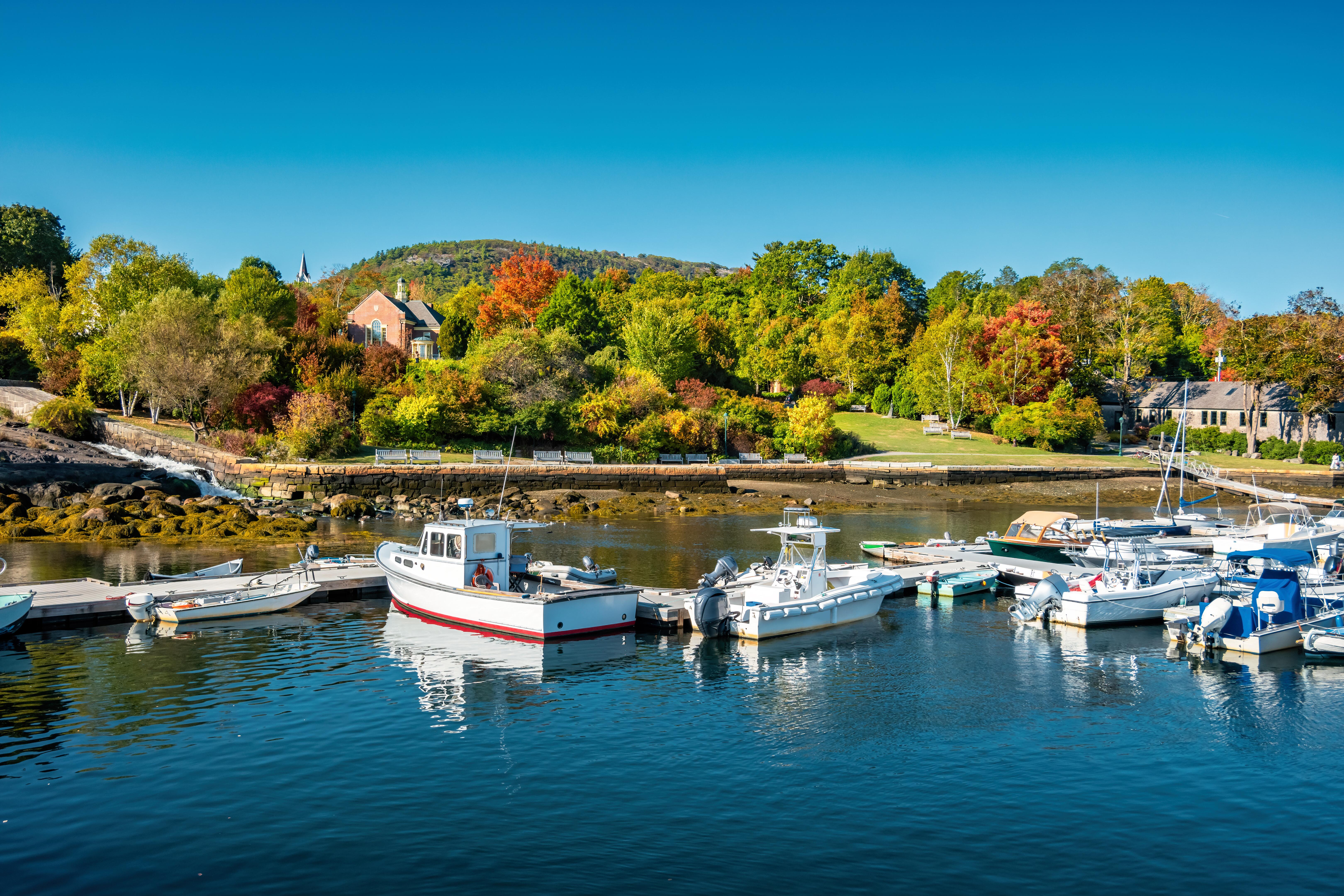 Image of a harbor in Camden, Maine, in the fall.
