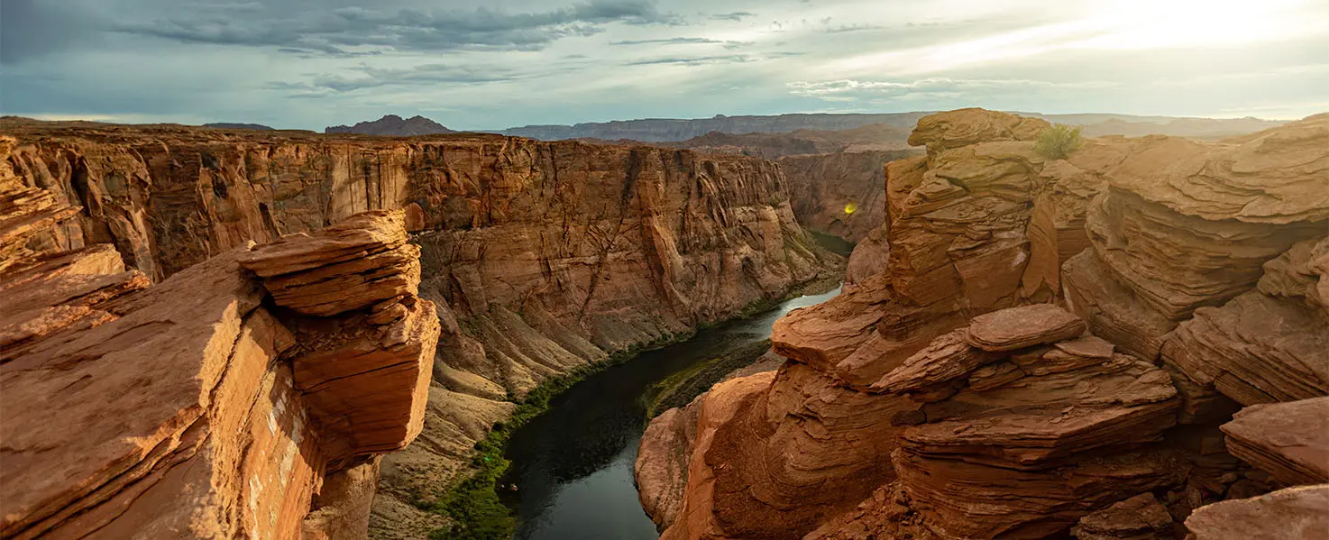A wide shot of the Grand Canyon National Park at dusk