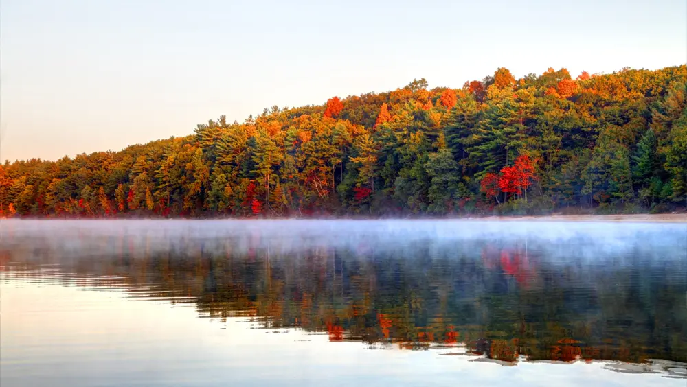 Walden Pond, a popular day trip from Boston, in the fall.