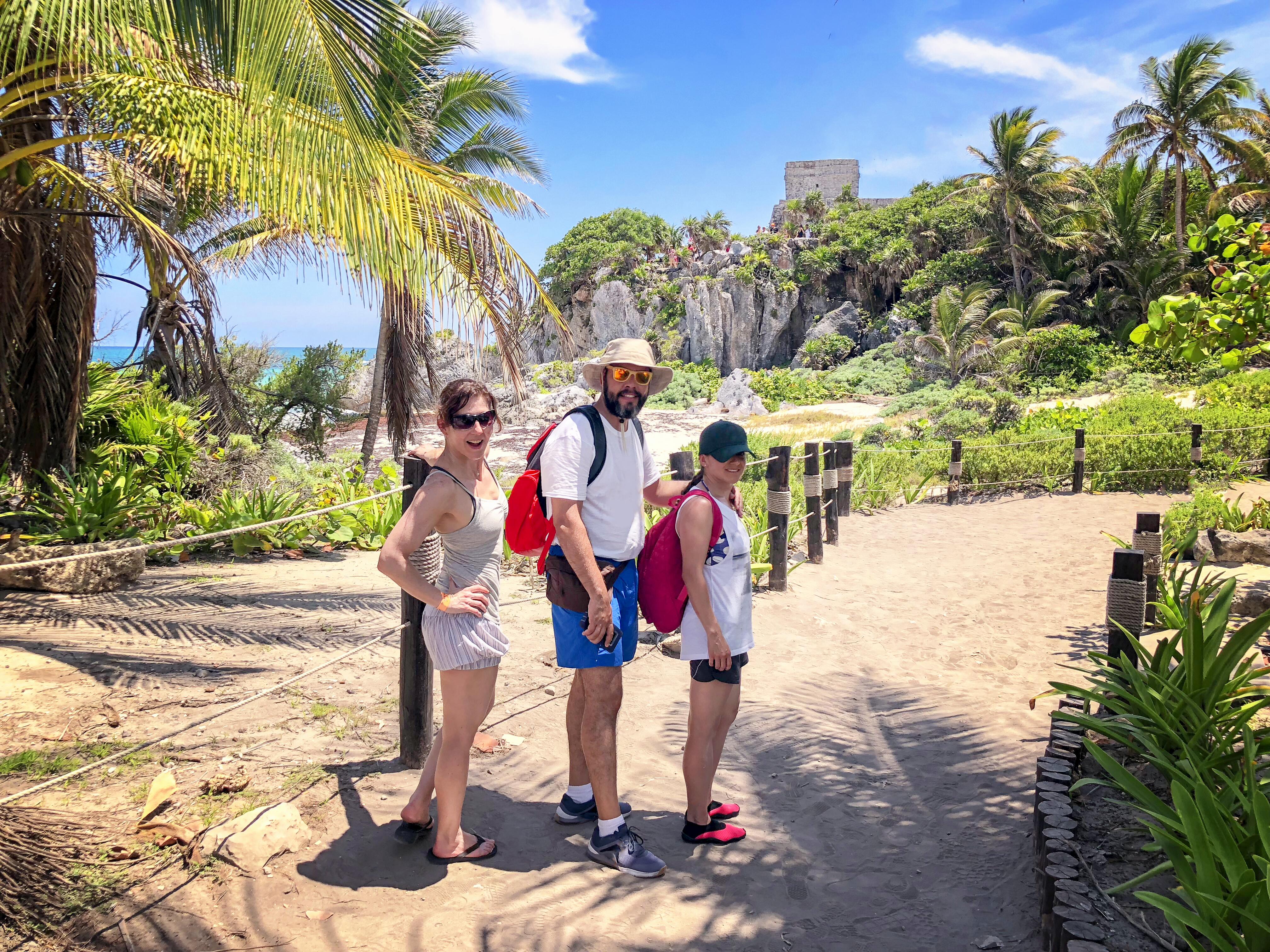 Image of tourists at Tulum ruins.
