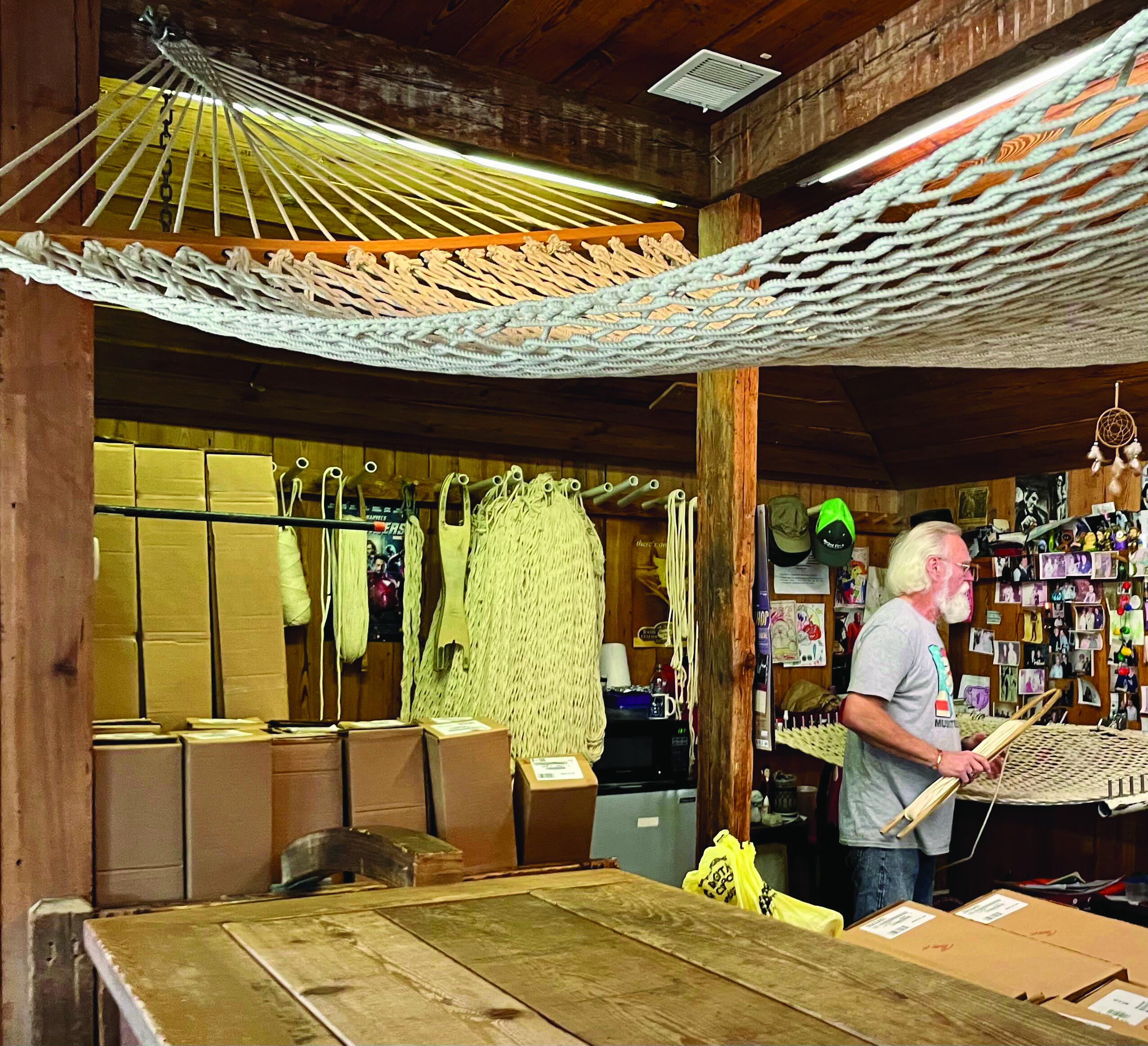 A weaver demonstrates his craft at the Hammock Weavers Shop on Pawleys Island.