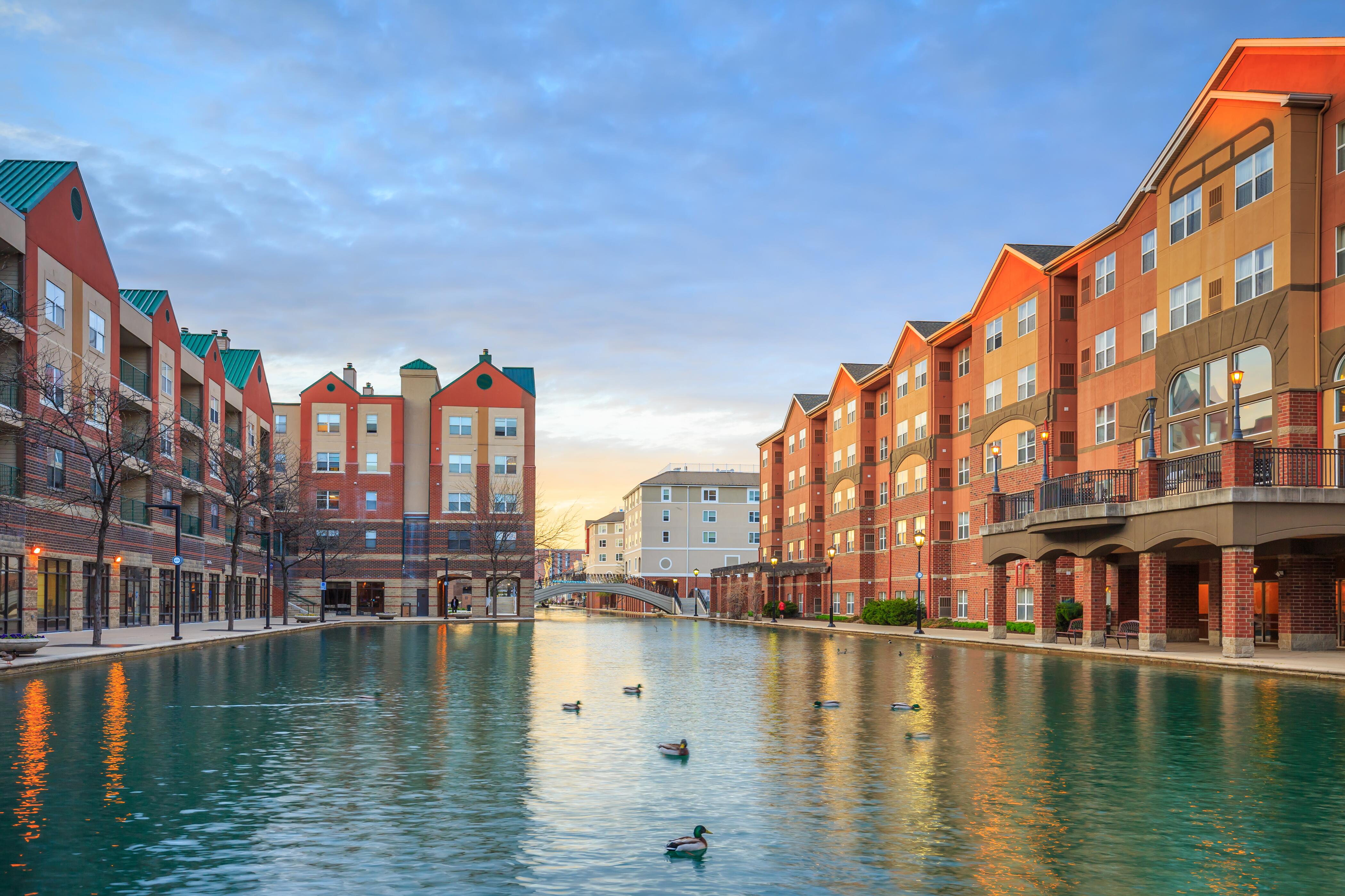 Downtown Indianapolis contemporary style buildings near Central Canal Walk with ducks swimming