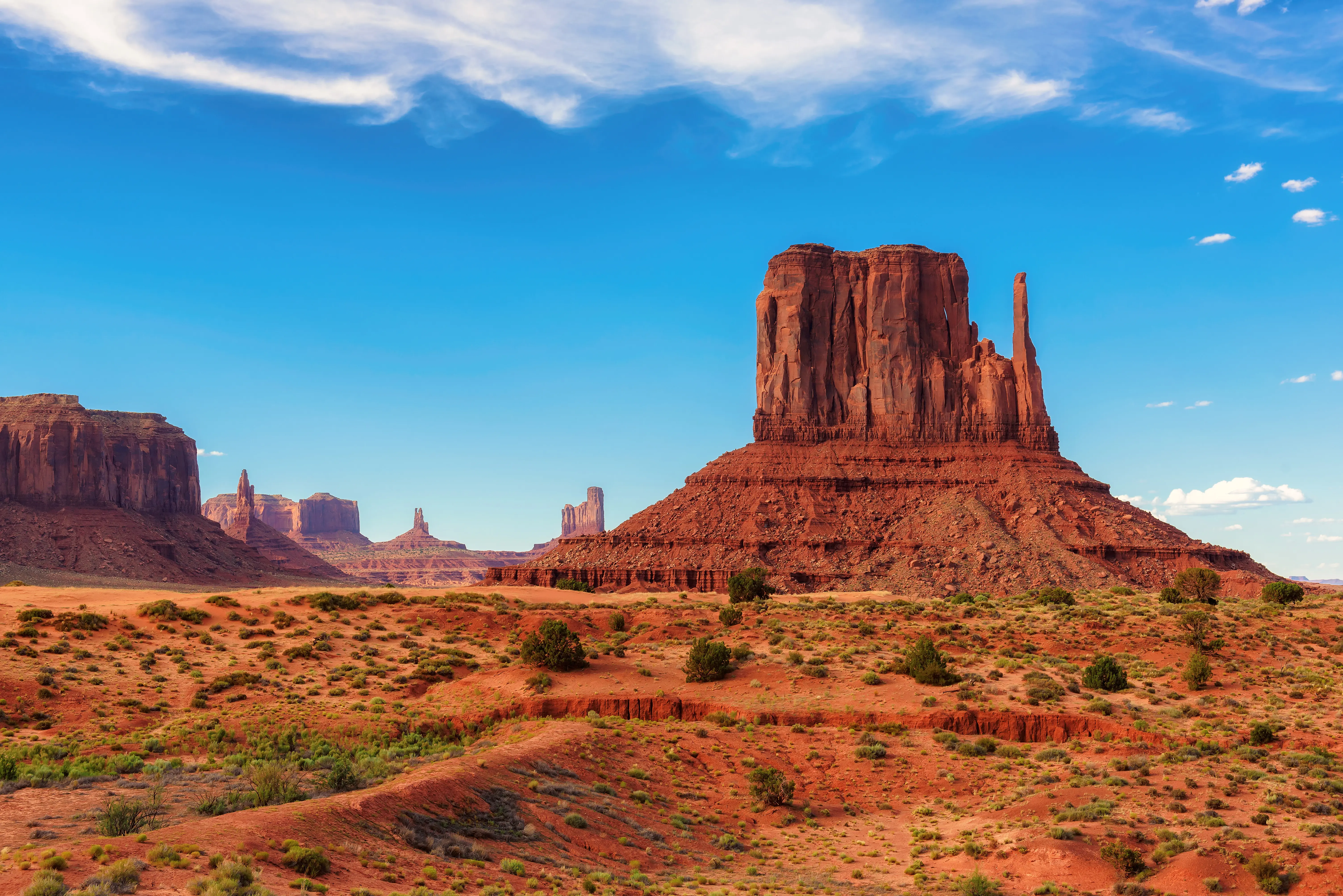 Monument Valley West Thumb desert landscape and stunning red rock monoliths, Arizona, USA