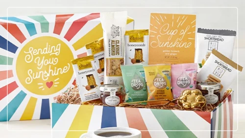 The Tea for You Market Box Sending Sunshine from 1-800-Baskets makes a great food gift idea.
