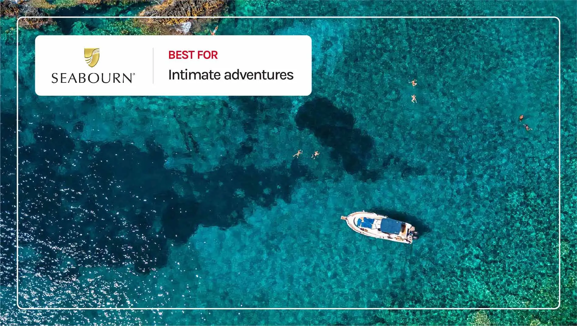 An aerial view of couples snorkeling in the ocean.