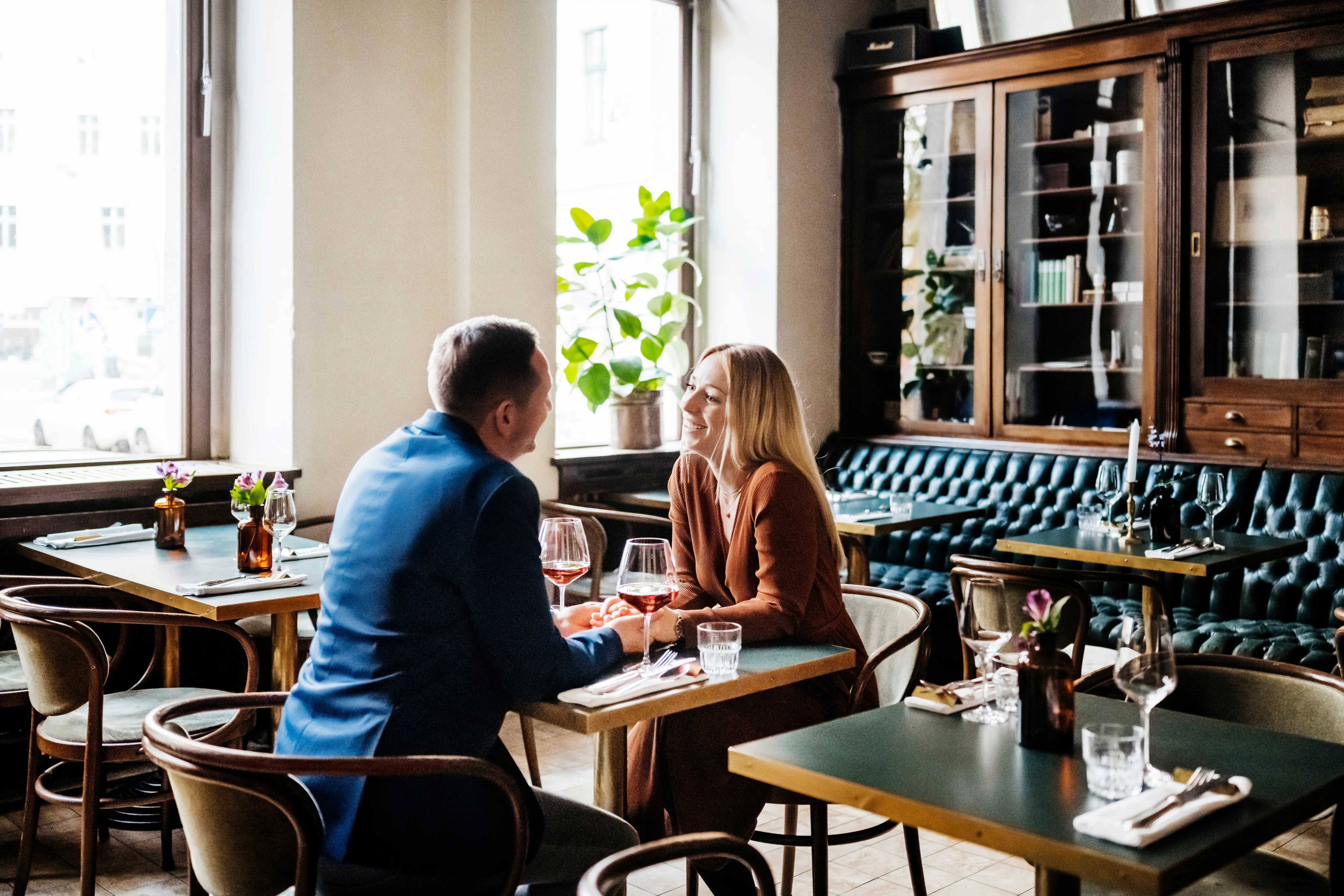Interior photo of a couple dining at a restaurant.