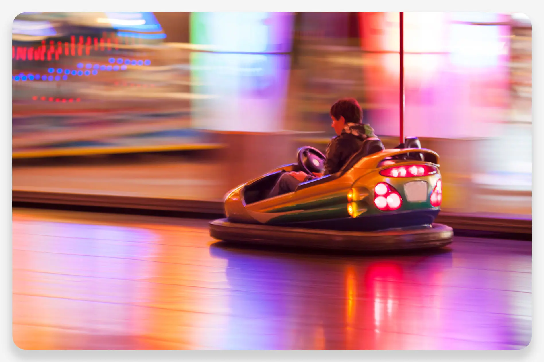A child riding a bumper car