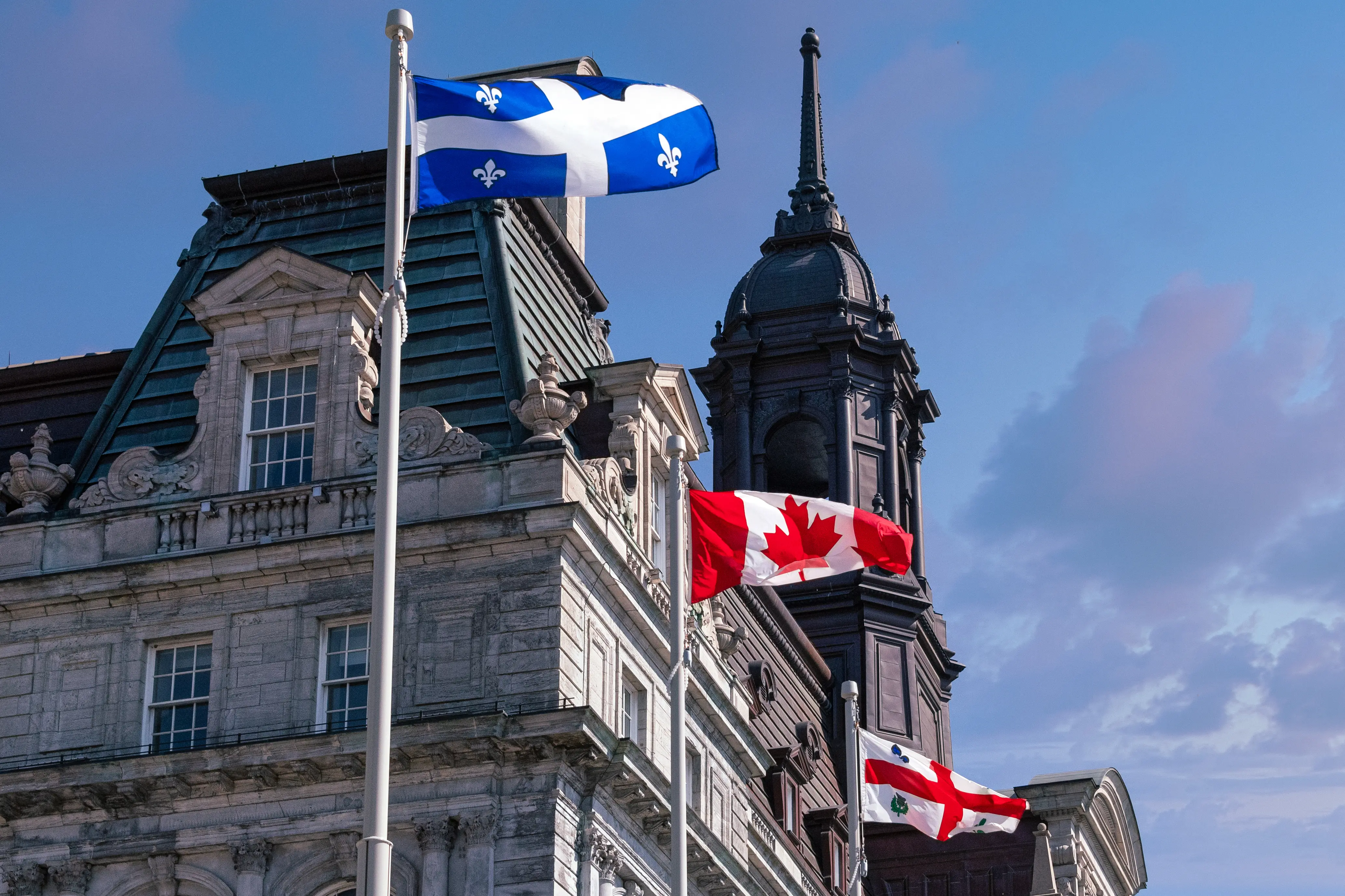 Photo of Flags on Montreal City hall of Montreal, Canada