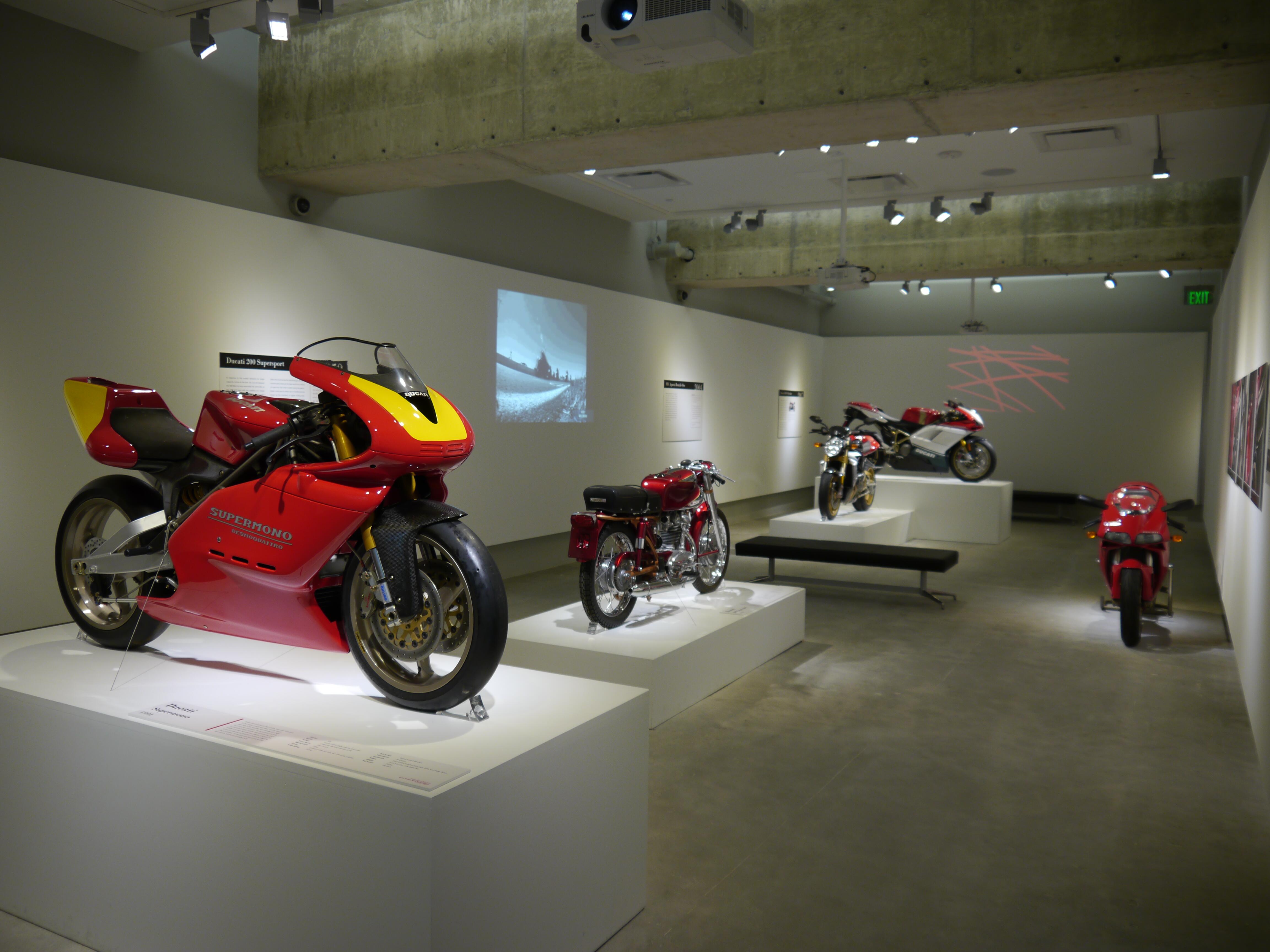 Interior image of a motorcycle exhibition at the Museum of Design Atlanta.