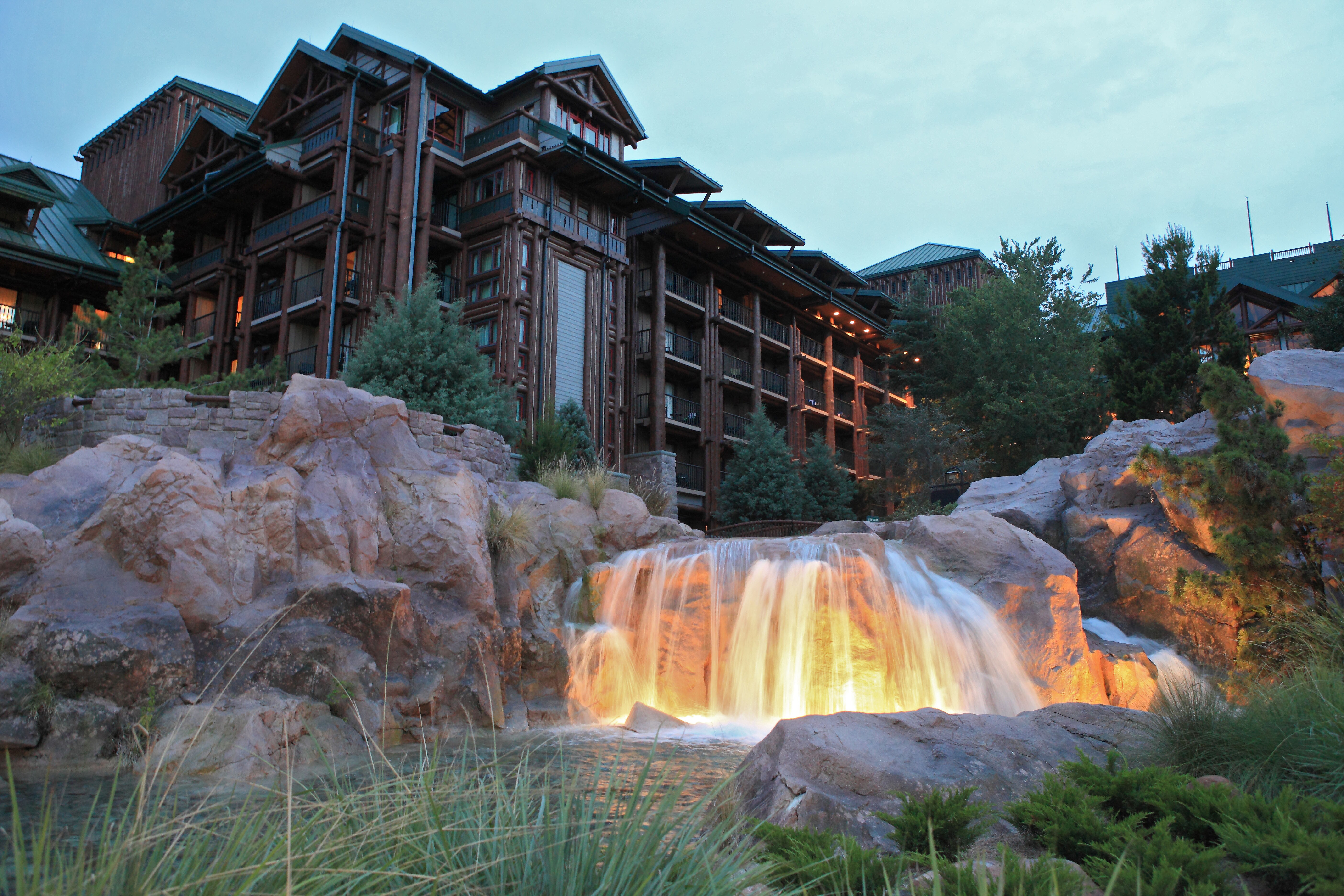 Image of Disney's Wilderness Lodge resort at dusk.