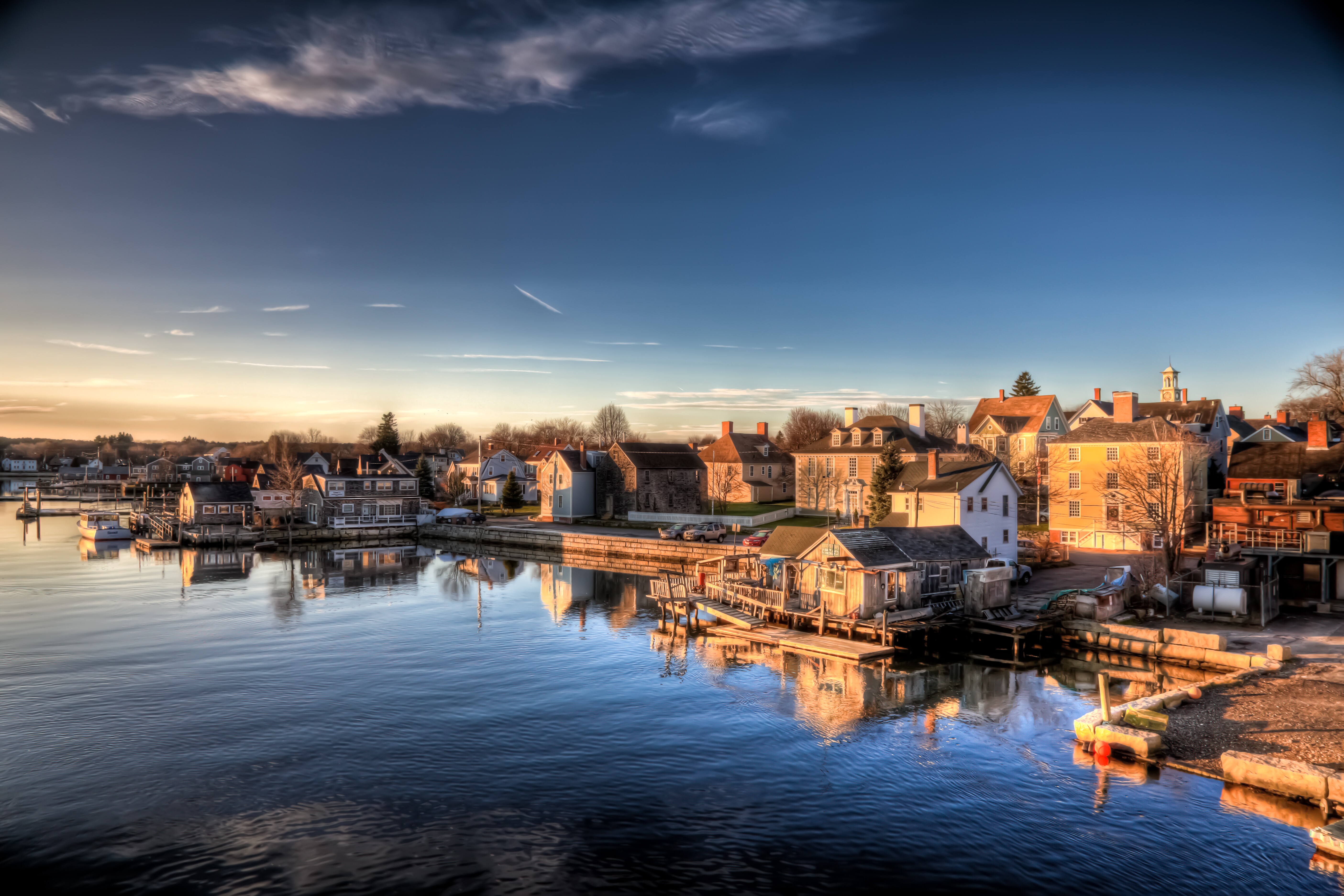 Image of sunrise illuminating the historic South End waterfront of Portsmouth, New Hampshire.