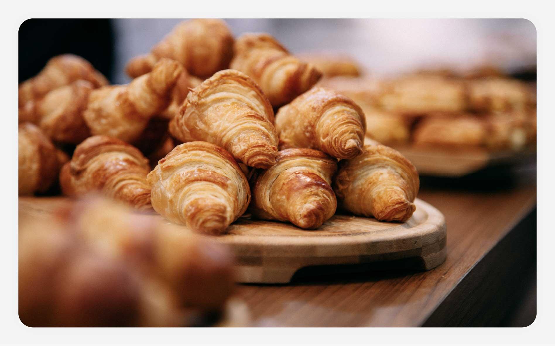 A centerpiece of croissants in a bakery