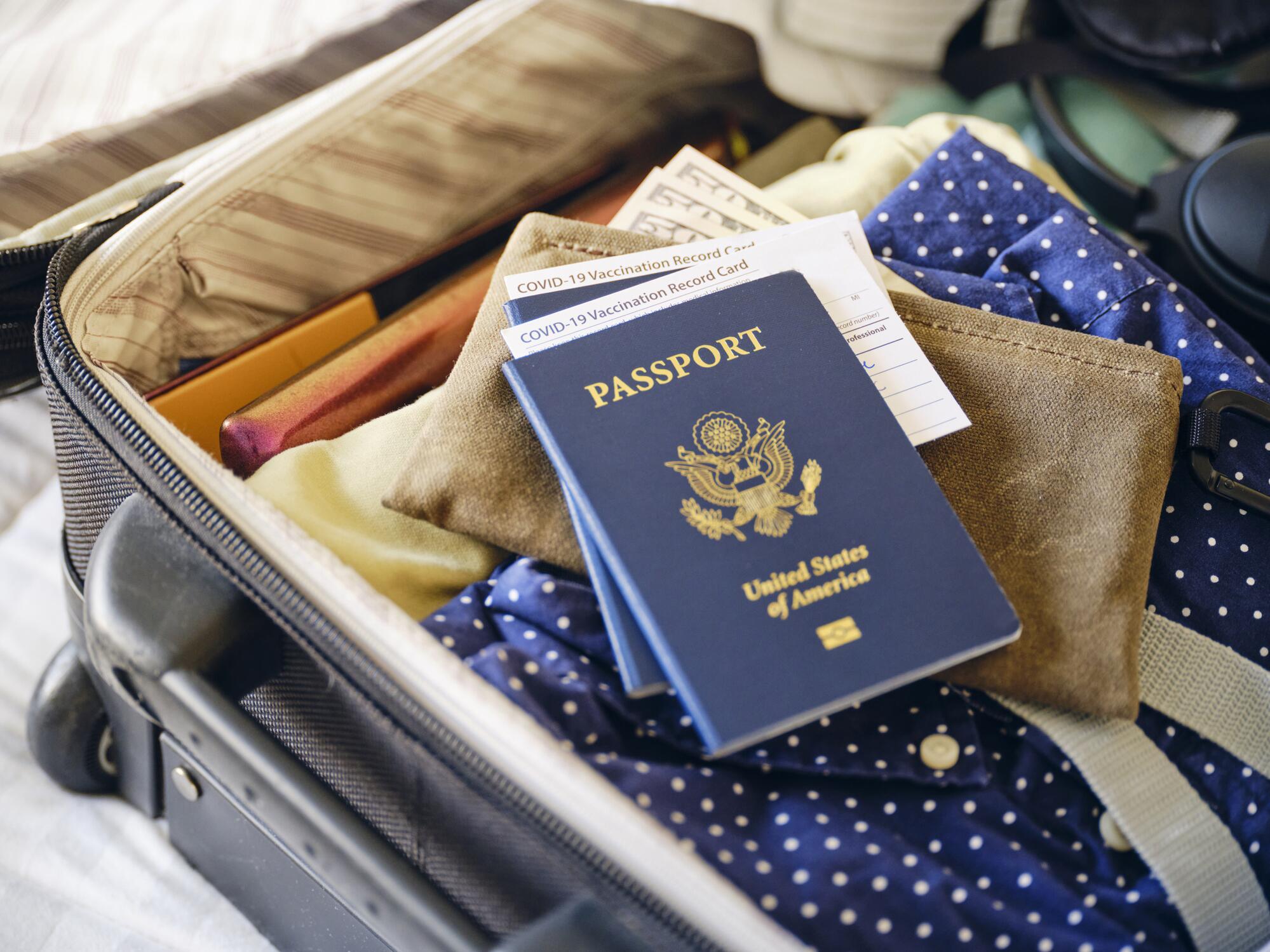 Passport in a packed suitcase