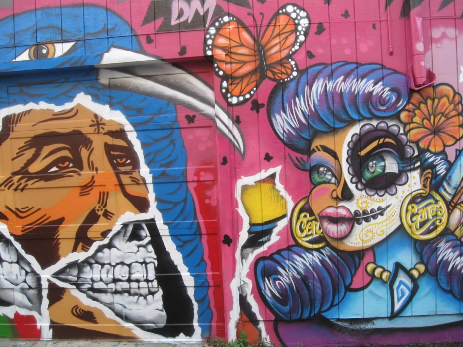 Murals and street art along Lilac Alley in the Mission District of San Francisco, California