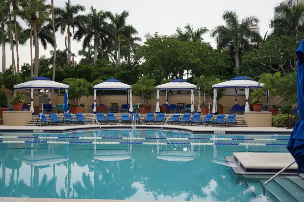 Pool with cabanas at the Ritz-Carlton, Naples in Florida.