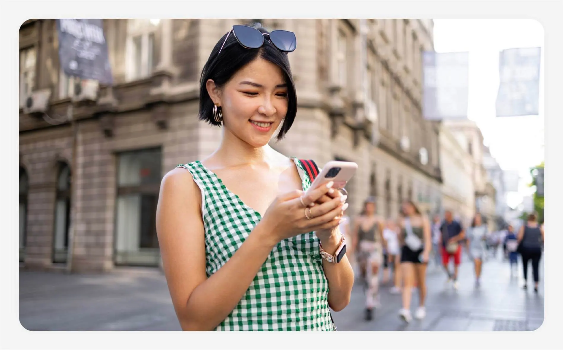Solo female traveler checking her phone