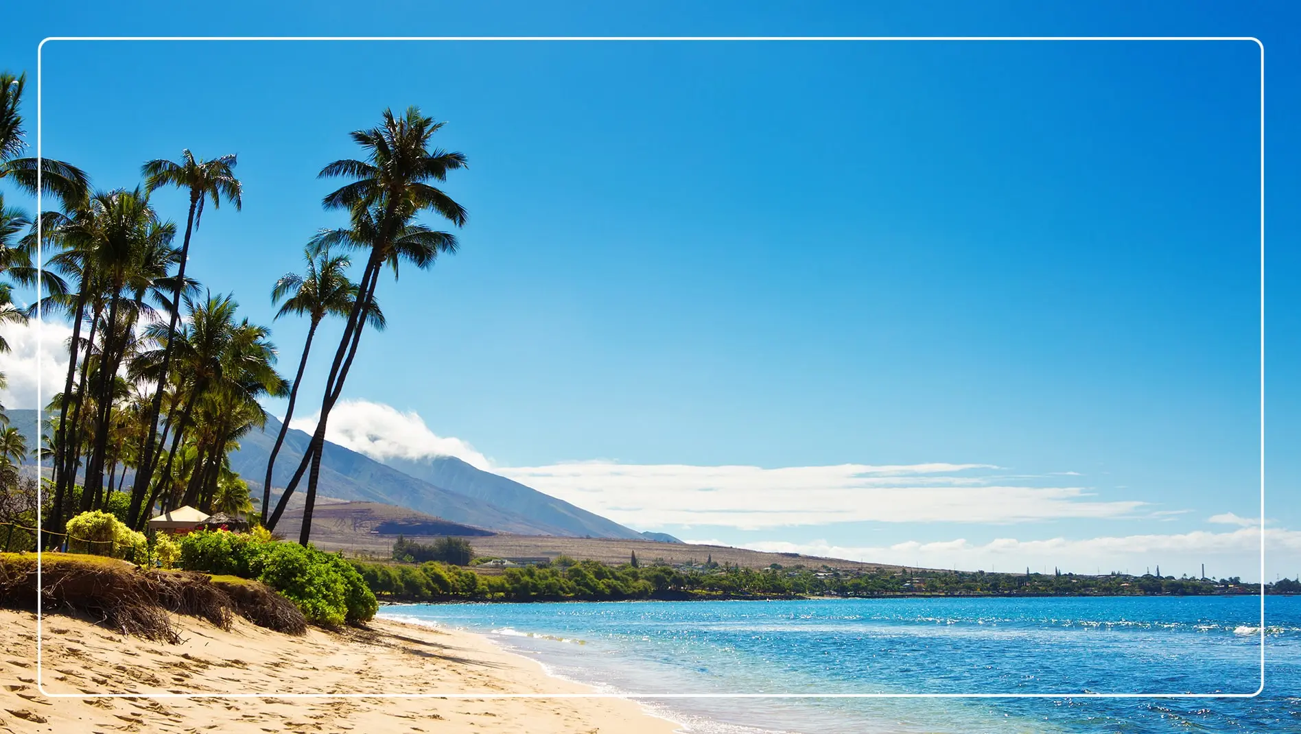 A beach with crystal blue waters in Maui, Hawaii.