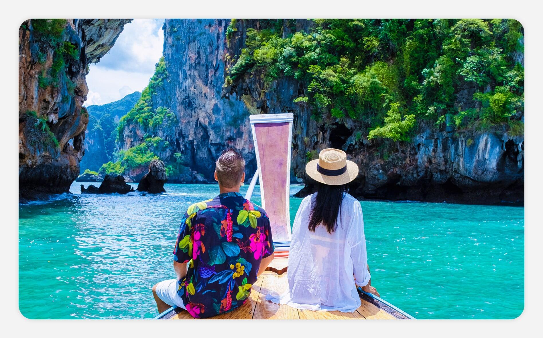 Couple on a longtail boat in Thailand