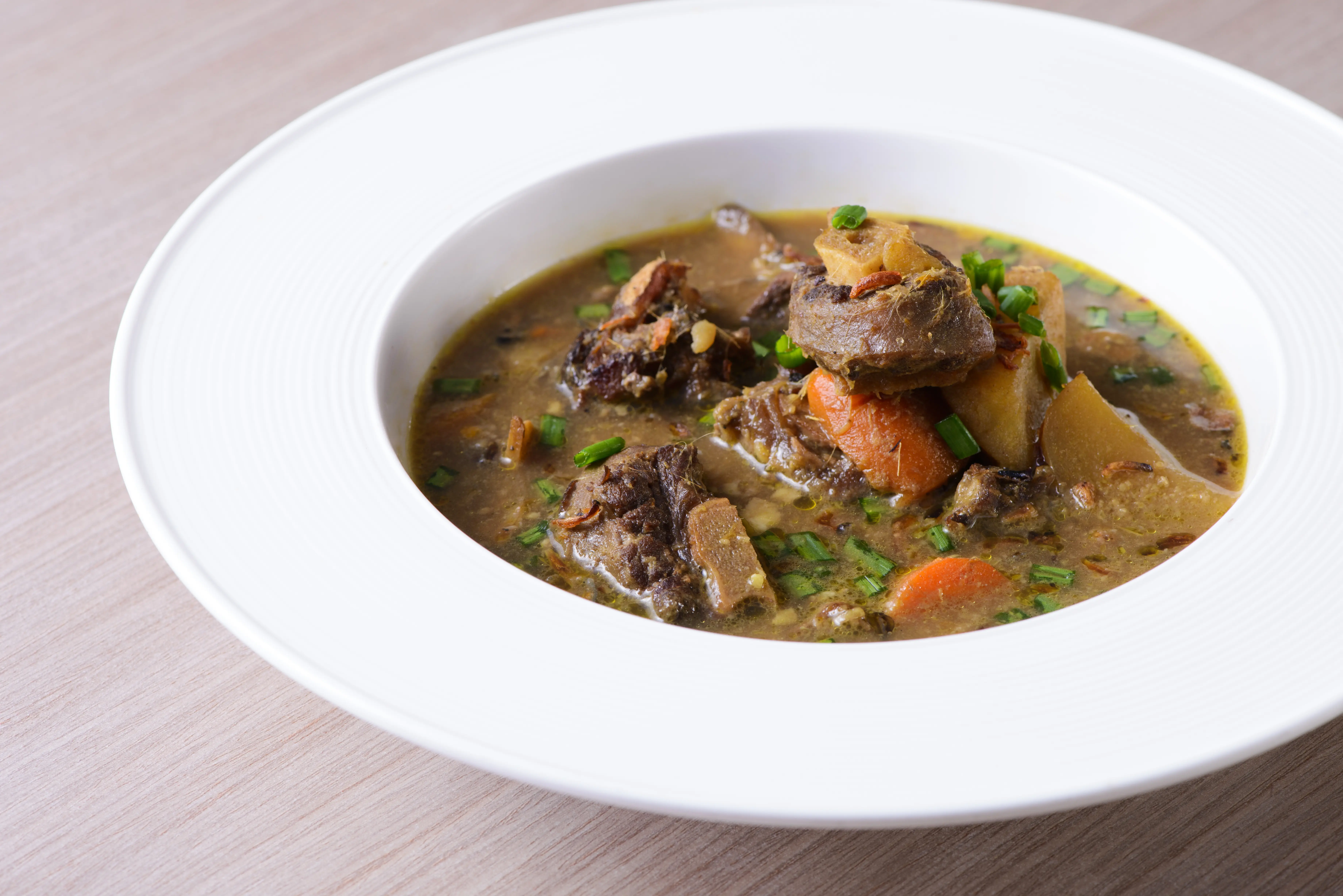 Image of a bowl of oxtail soup.