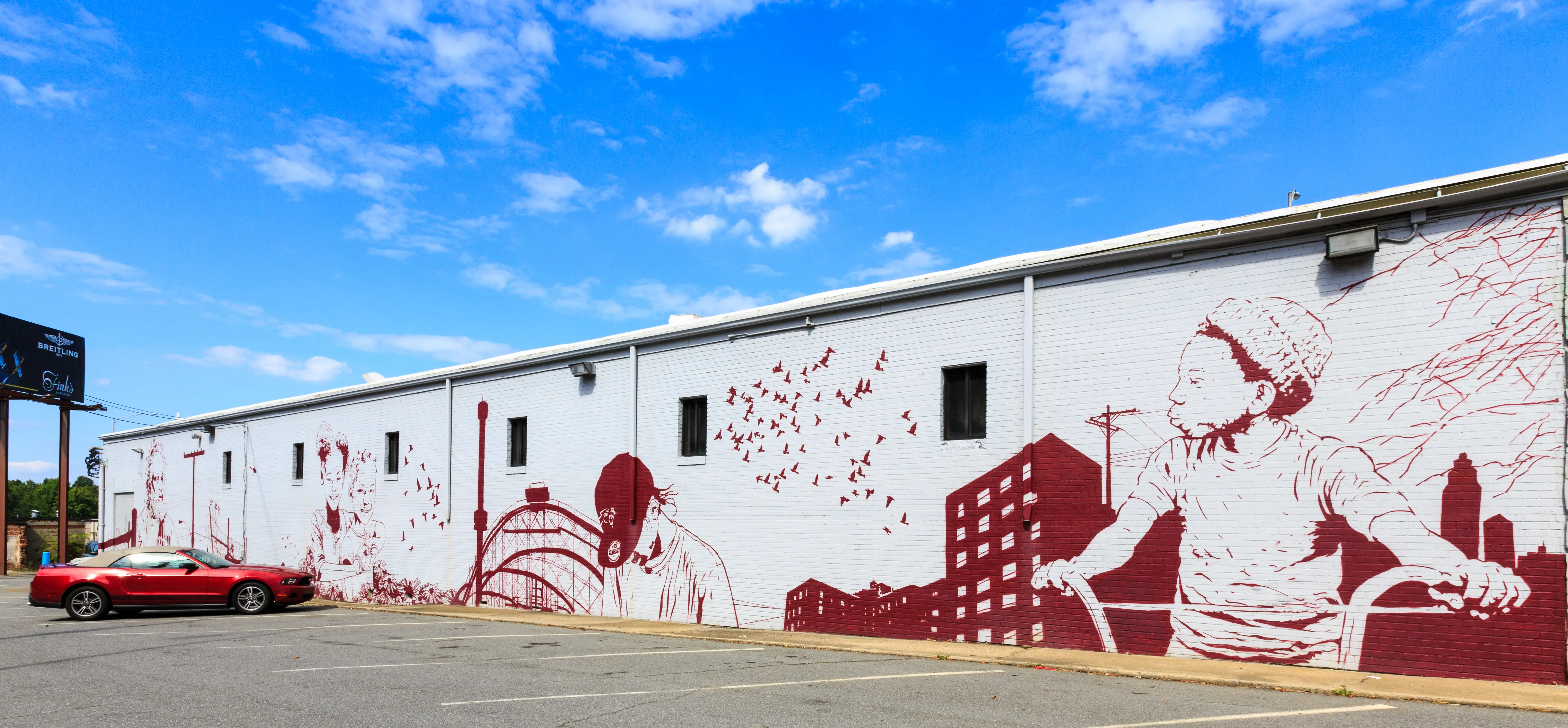 Outdoor picture of a mural across from the McColl Center for Visual Art