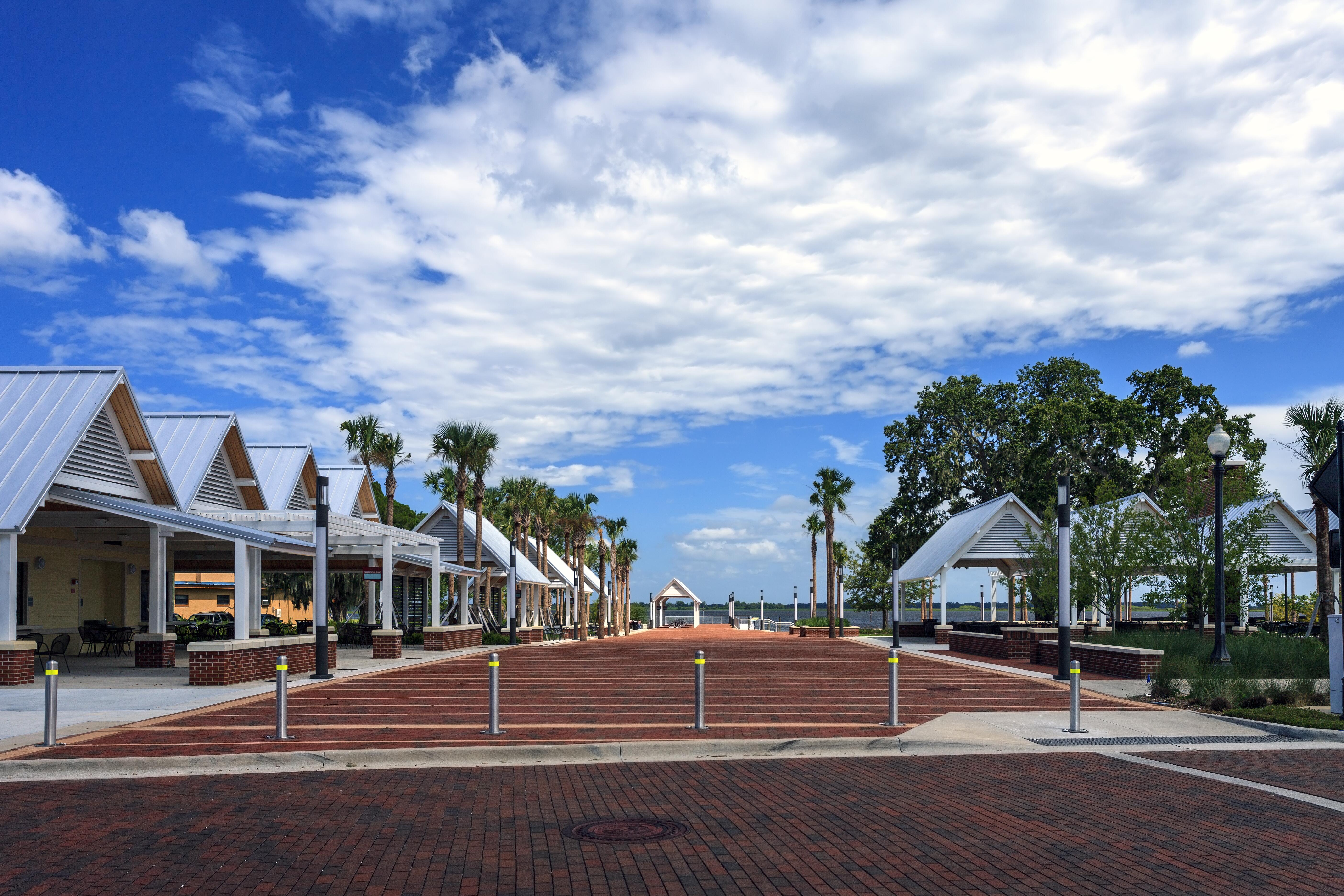 Palm Tree lined Kissimmee Lakefront Park has a wonderful Brick Promenade leading to the lake and many Pavilions where residents hold wedding receptions, birthday parties and for other family occasions.