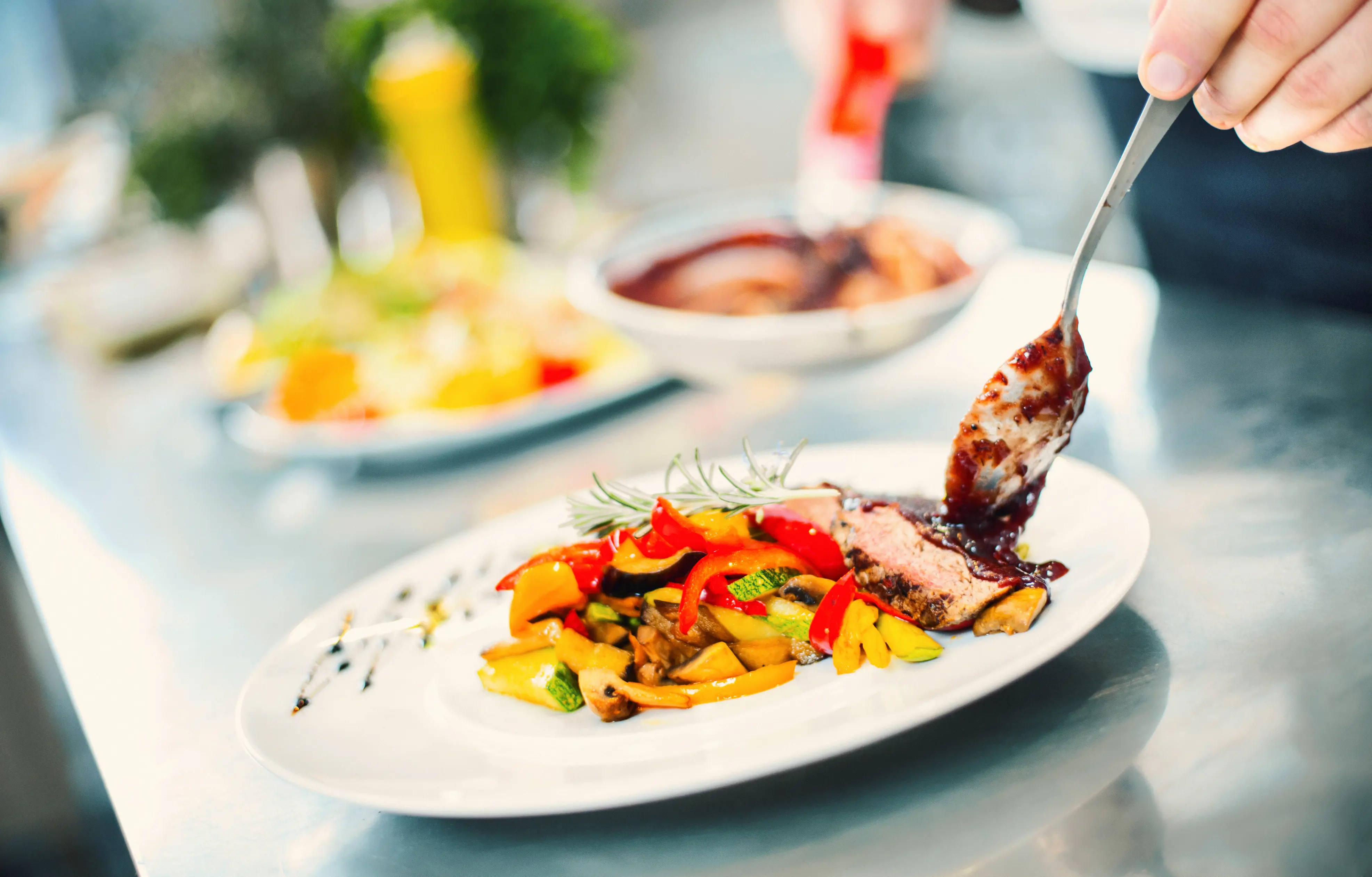 Food plates being served at a restaurant