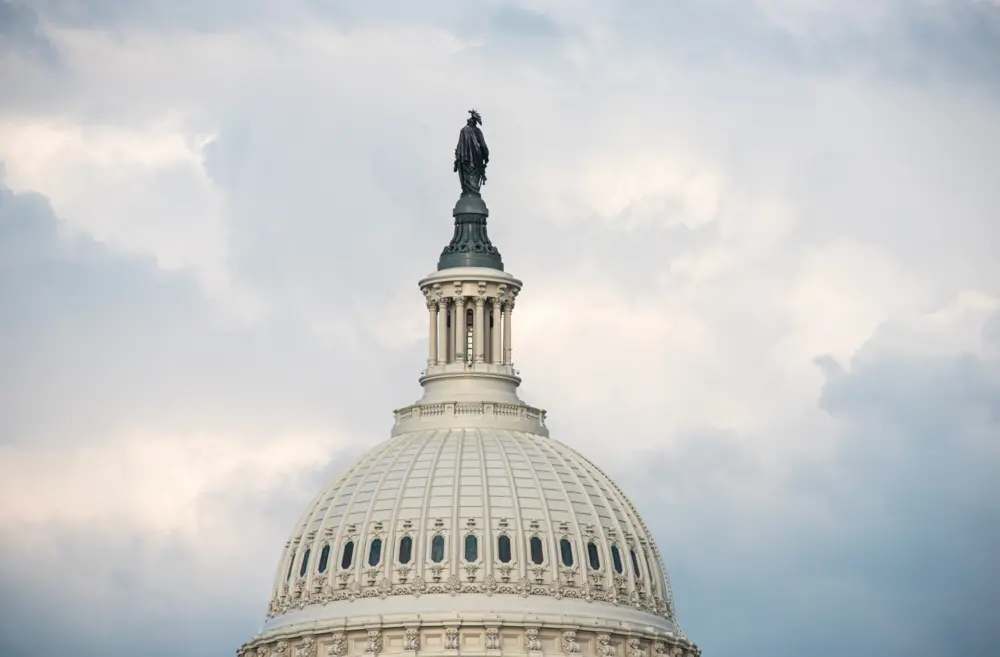 The roof dome of the US Capitol Building, with the Statue of Freedom visible