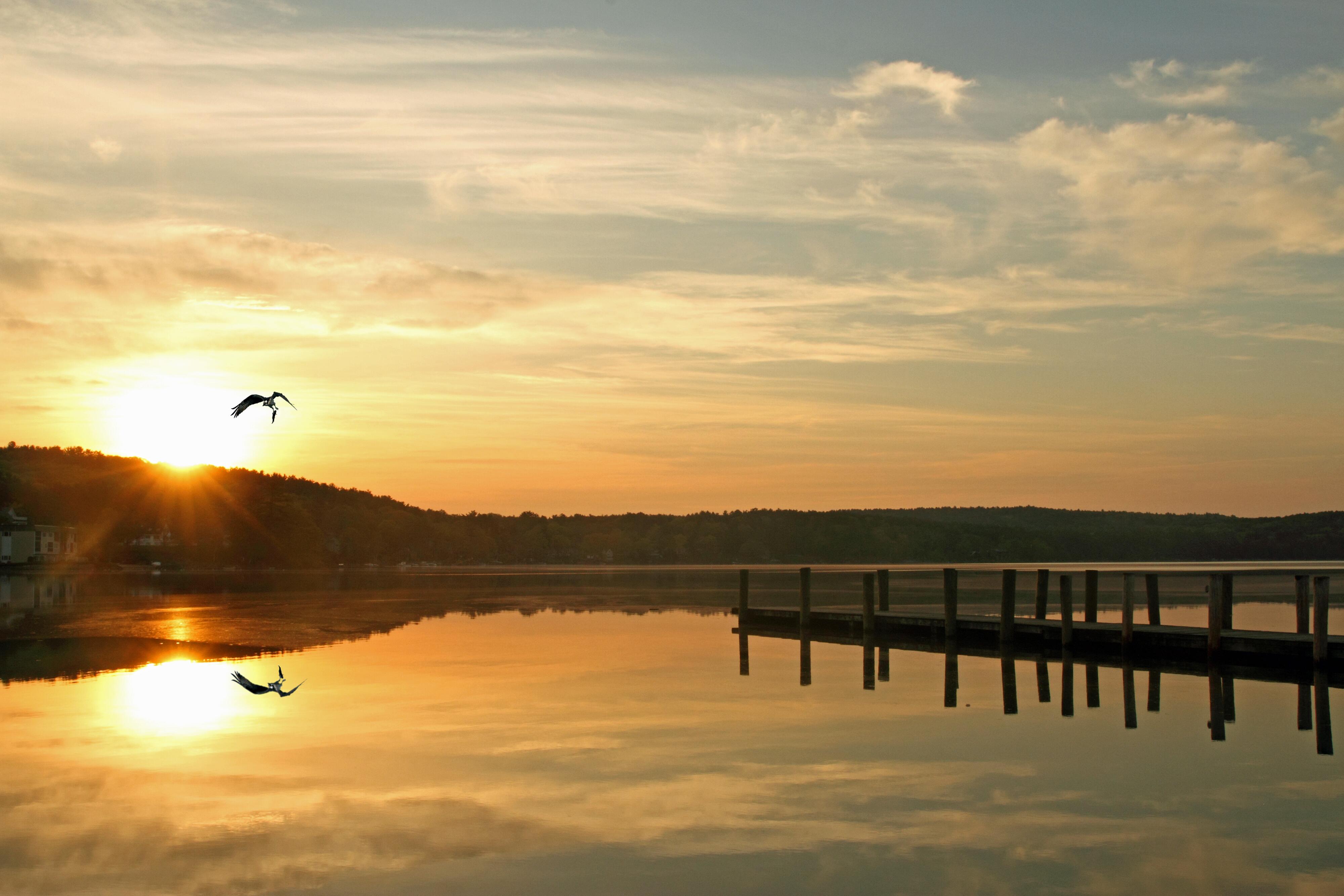 Image of Lake Winnipesaukee during sunset.
