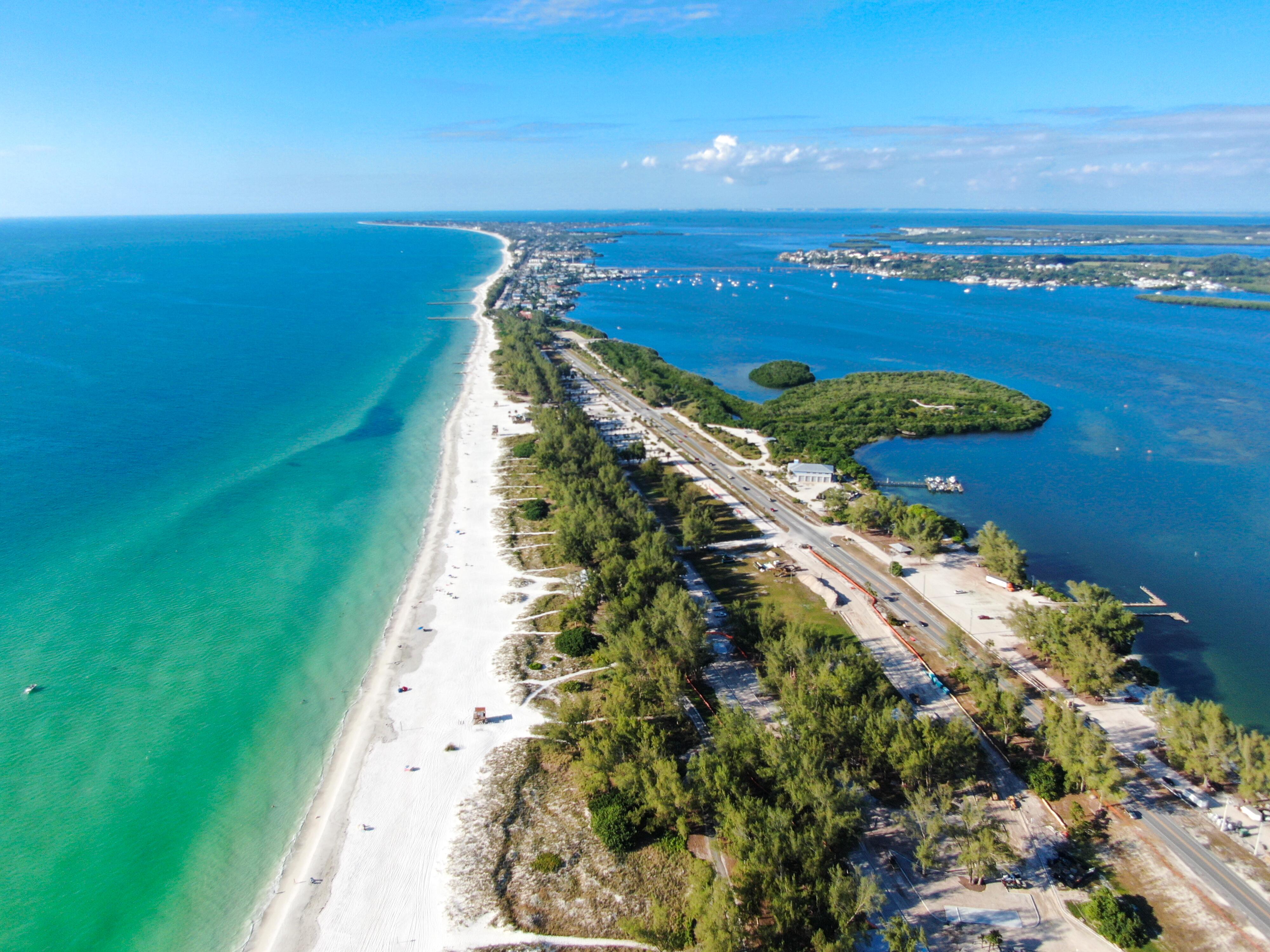 Aerial view of Anna Maria Island, white sand beaches and blue water, barrier island on Florida Gulf Coast. Manatee County. USA.