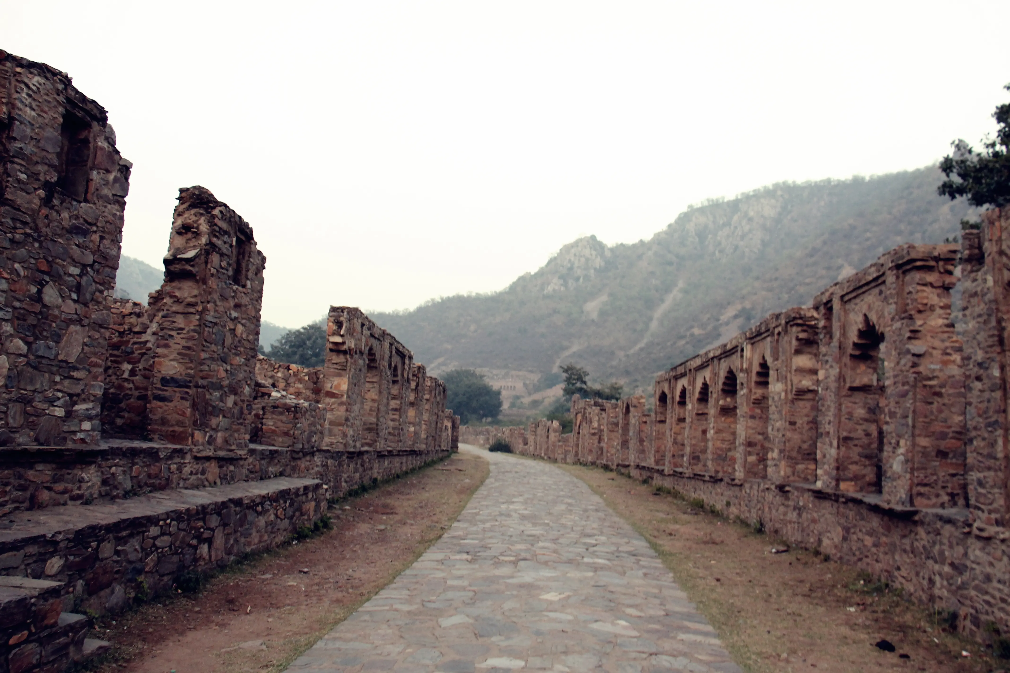 Eerie outdoor photo of Bhangarh Fort, in the Rajasthan state of India.