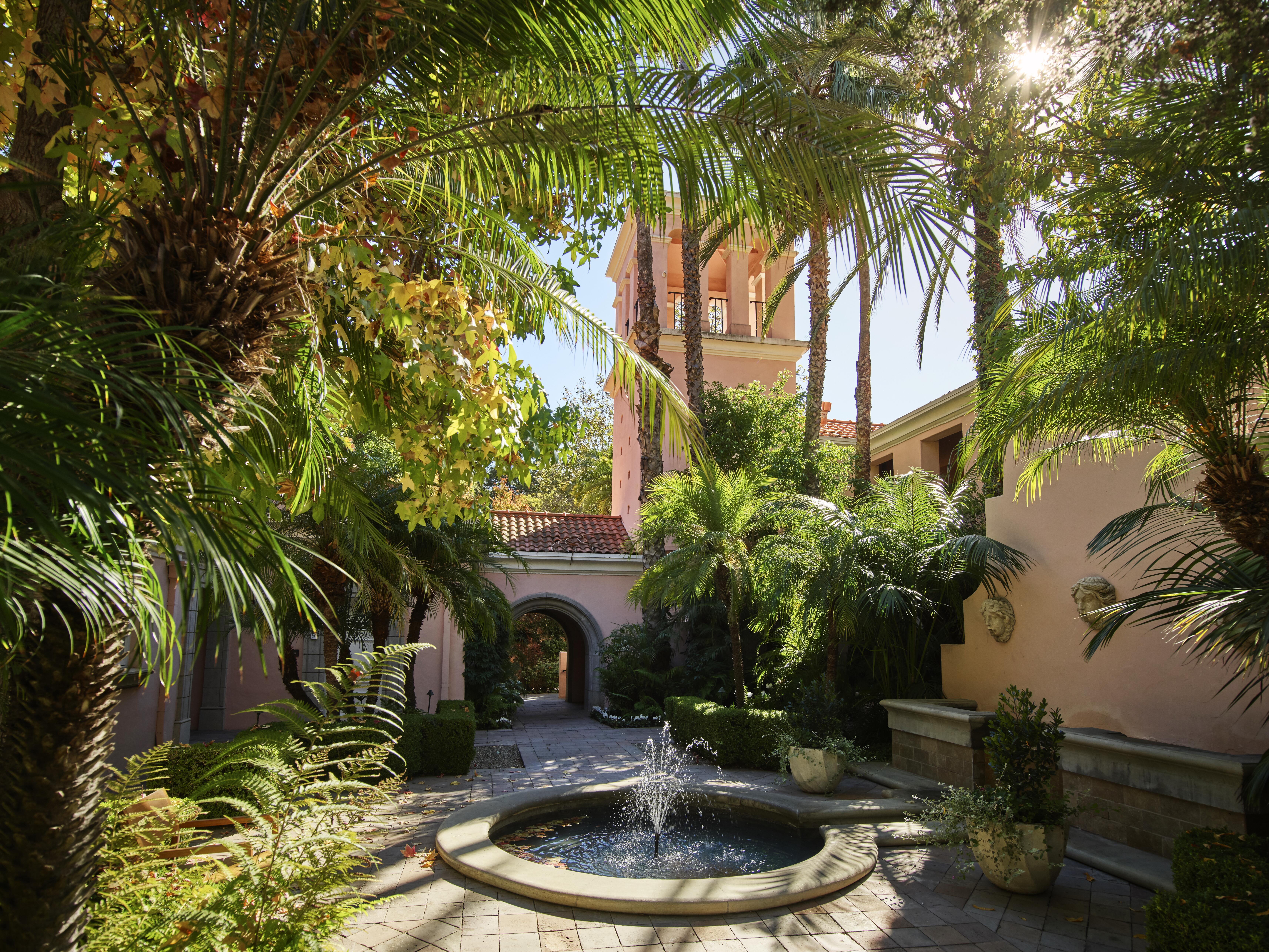 Image of the exterior and lush vegetation surrounding the Hotel Bel-Air.